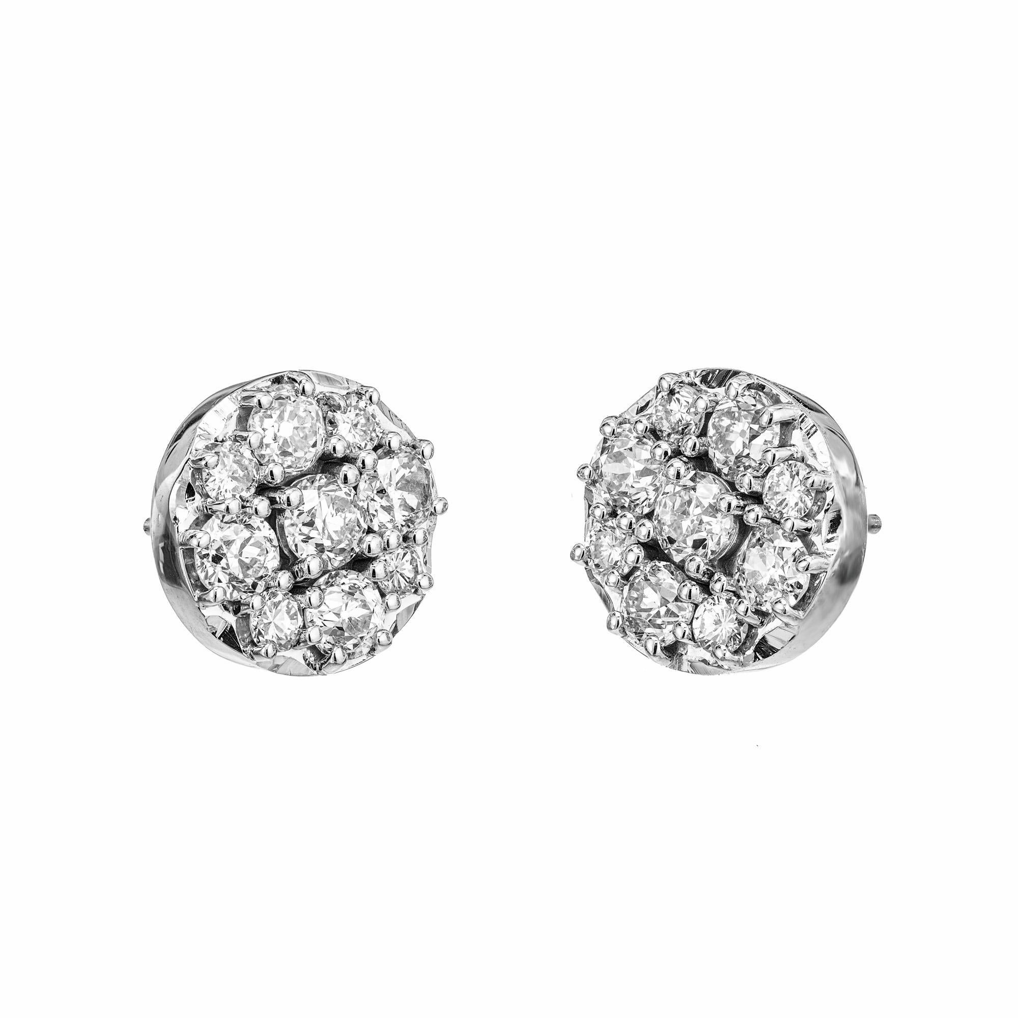 Round diamond cluster earrings in 14k white gold. 18 round Old European cut diamond clusters, set in 14k white gold settings. 

18 round old European cut diamonds, I-J VS-SI approx. 1.96cts
14k white gold 
Stamped: 14k
4.4 grams
Top to bottom: