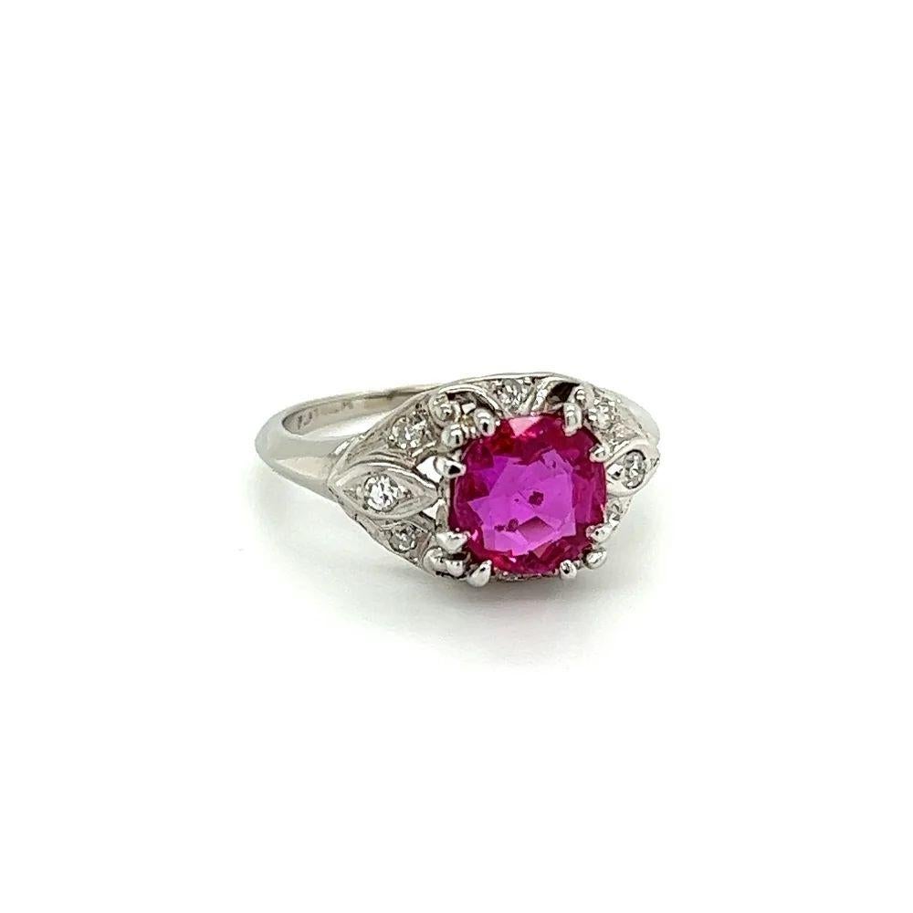 Simply Beautiful! Finely detailed Natural Purple Red NO HEAT BURMA Ruby GIA and Diamond Platinum Vintage Cocktail Ring. Centering a securely nestled Hand set Fabulous Purple Red BURMA Ruby GIA, weighing 1.96 Carats. GIA #7431532156. Surrounded by