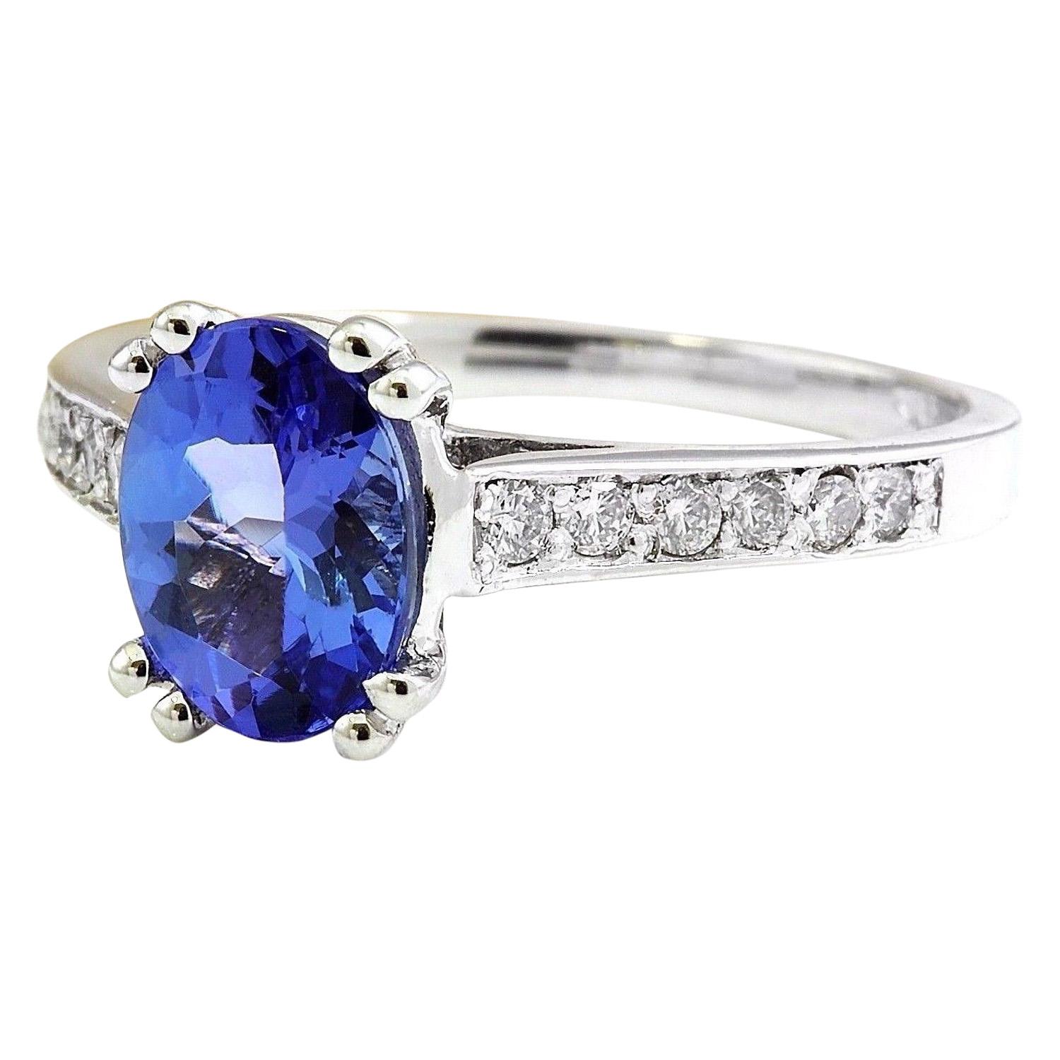 Introducing our exquisite 14 Karat White Gold Ring featuring a captivating 1.96 Carat Natural Tanzanite gemstone. Crafted with precision and elegance, this ring is adorned with a 1.78 Carat Tanzanite gemstone, measuring 8.00x6.00 mm, and accented