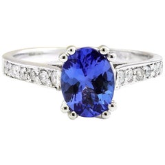 Bague exquise en or blanc massif 14 carats avec tanzanite naturelle et diamants 