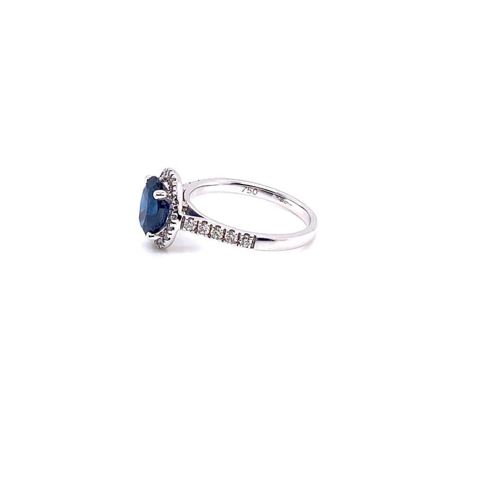 1.96 Carat Oval Cut Blue Sapphire and Diamond Ring in 18k White Gold In New Condition In London, GB