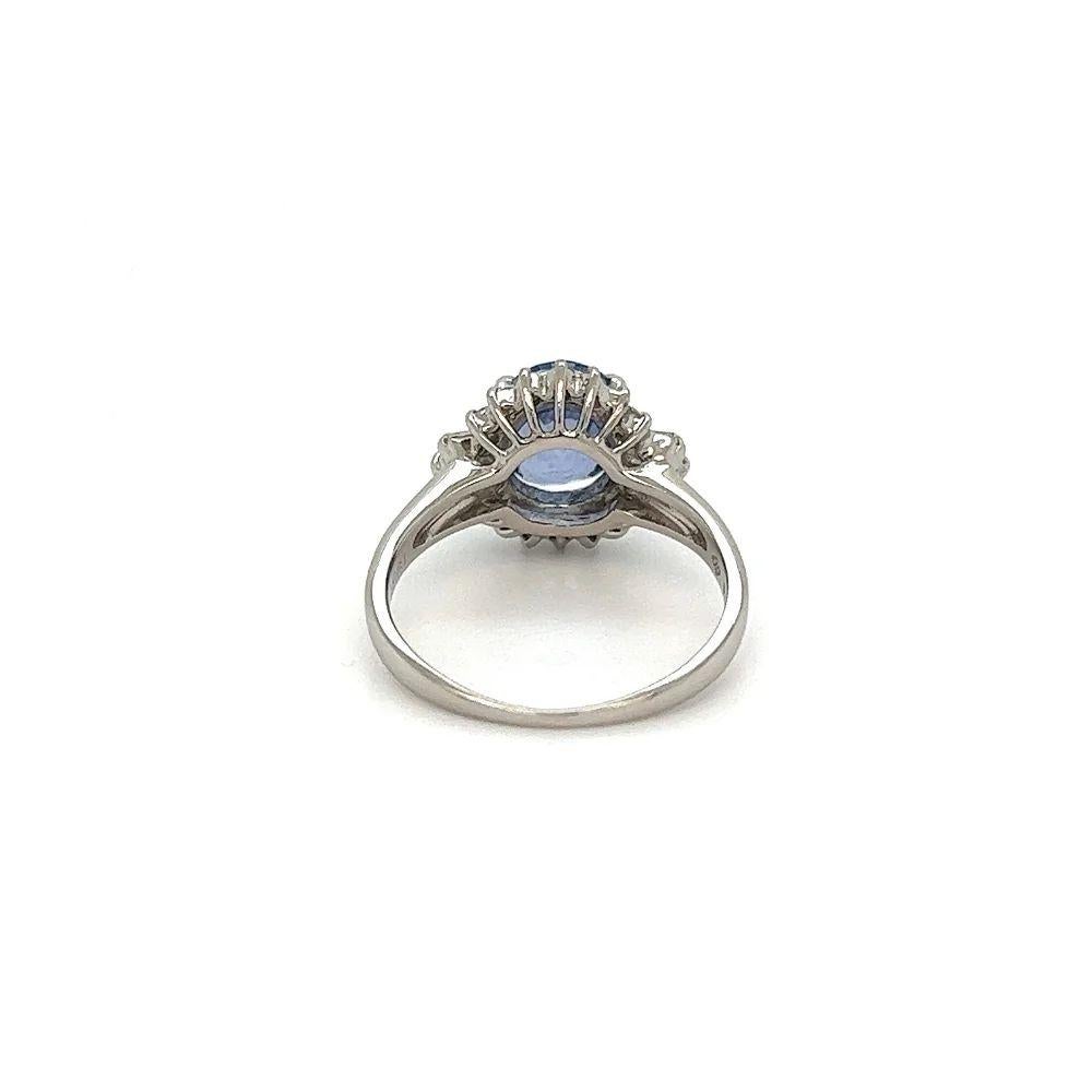 Mixed Cut 1.96 Carat Oval Sapphire and Diamond Vintage Platinum Ring For Sale