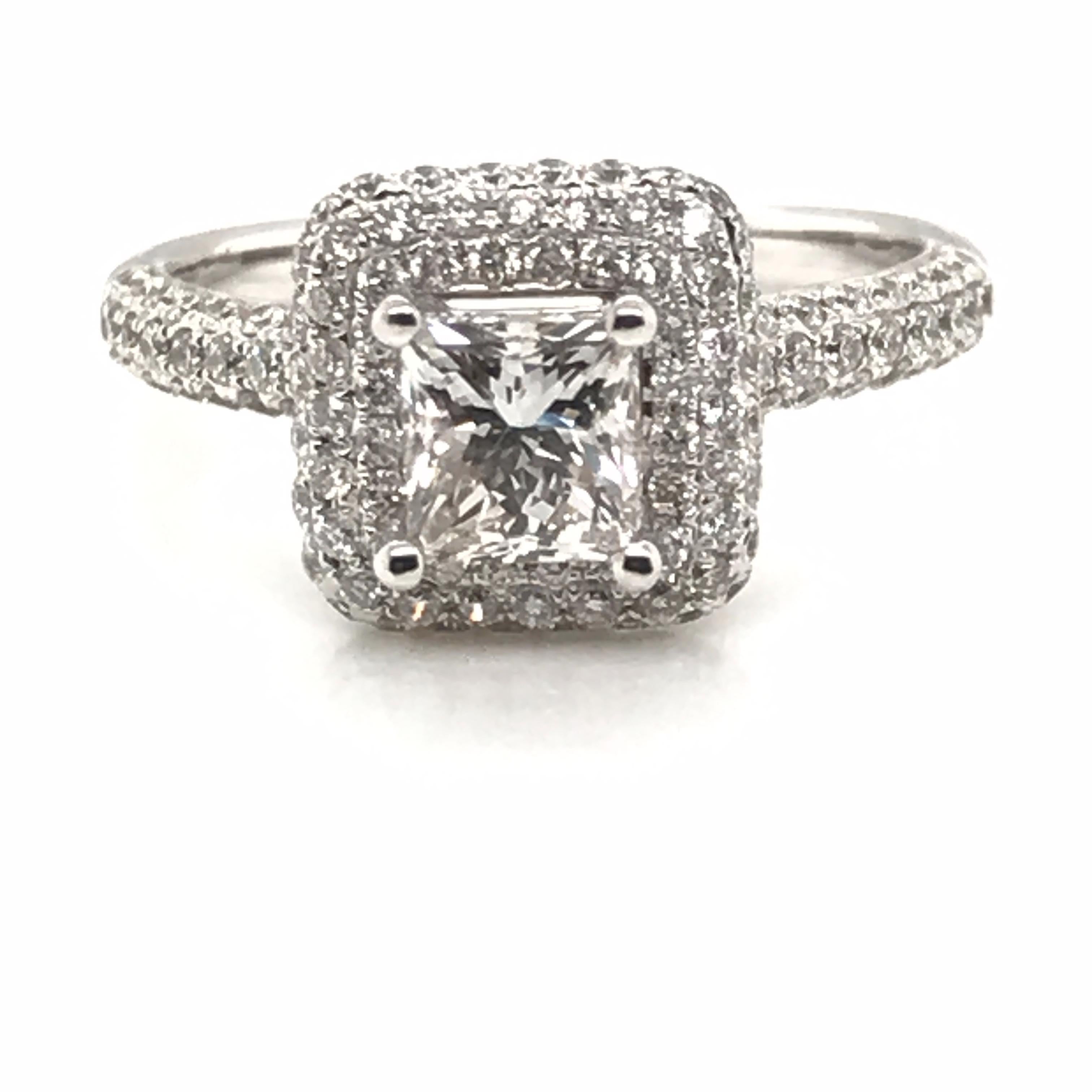 HJN Inc. Ring featuring a 1.96 Carat Princess Cut Center With Rounds Diamond Ring

Center Stone Diamond Weight: 1.01 Carats
Round-Cut Diamond Weight: 0.95 Carats

Total Stones: 159
Stone Quality: SI1
Color Grade: H
Total Diamond Weight: 1.96
Polish