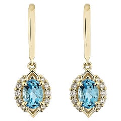 Boucles d'oreilles pendantes en or jaune 14 carats avec diamant, topaze bleue suisse de 1,96 carat.