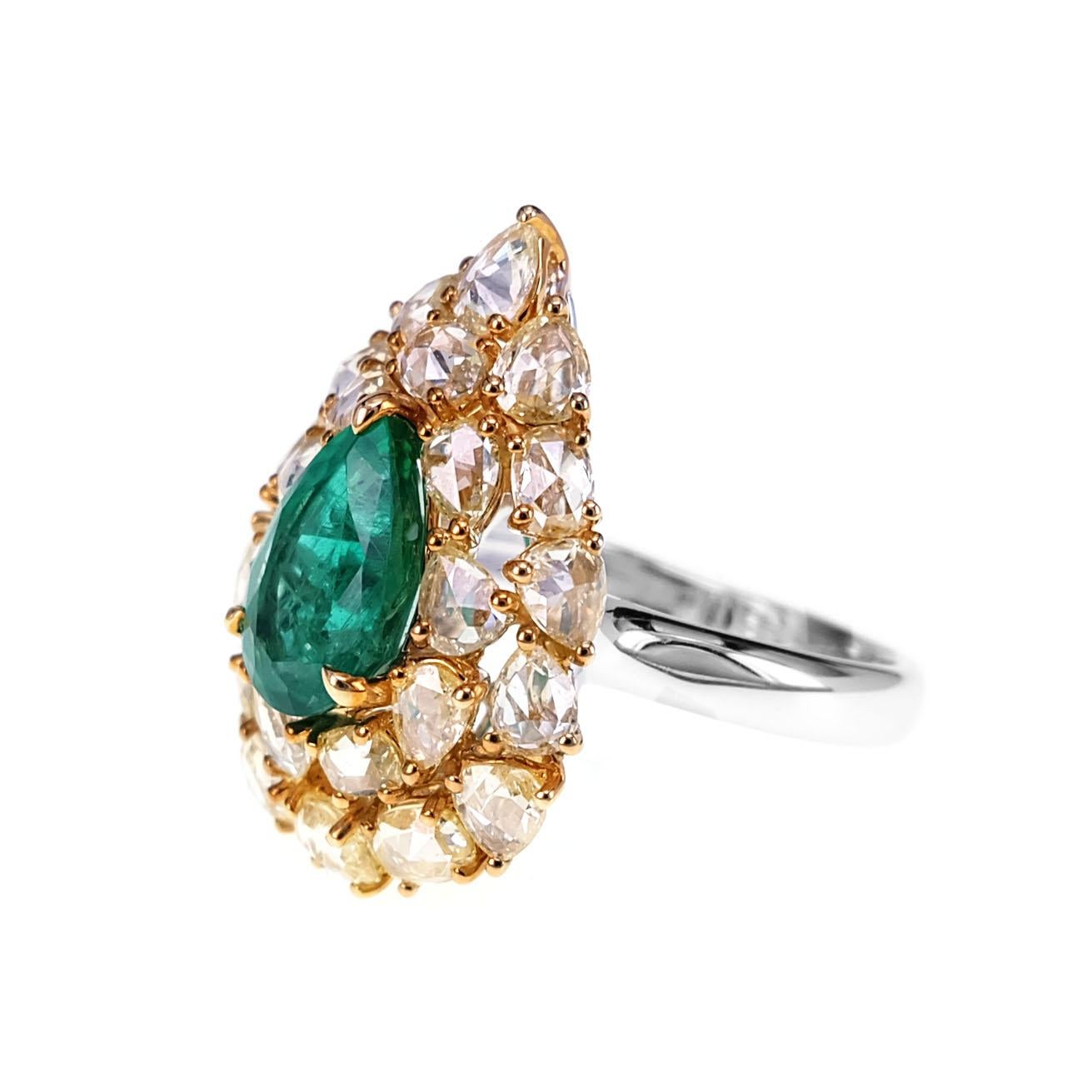 A beautiful combination of 1.96 carats of vivid green emeralds and 2.48 carats of yellow rose cut are set in this cocktail ring. The details of the ring are mentioned below:
Color: Fancy Light Yellow
Clarity: Vs
Ring Size: US 6.5
Ring size can be