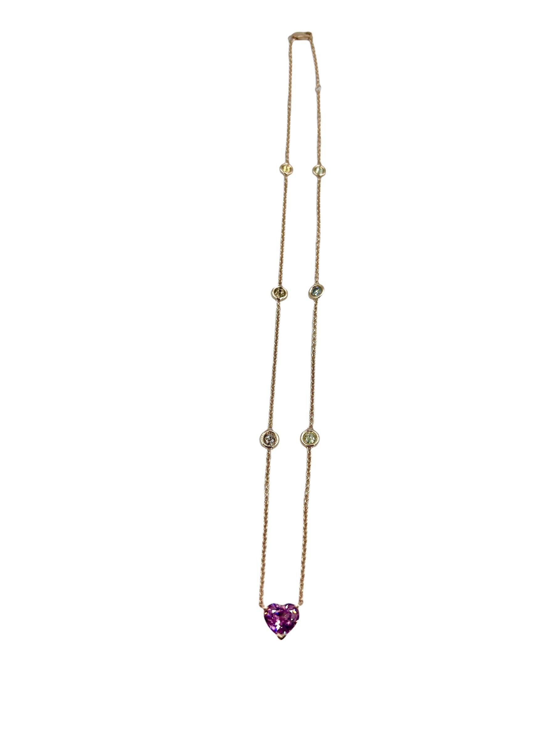 This handmade in the UK necklace had a beautiful pink coloured Spinel heart weighing at 1.96 carats on a double gallery collet. It is the centre of a 16