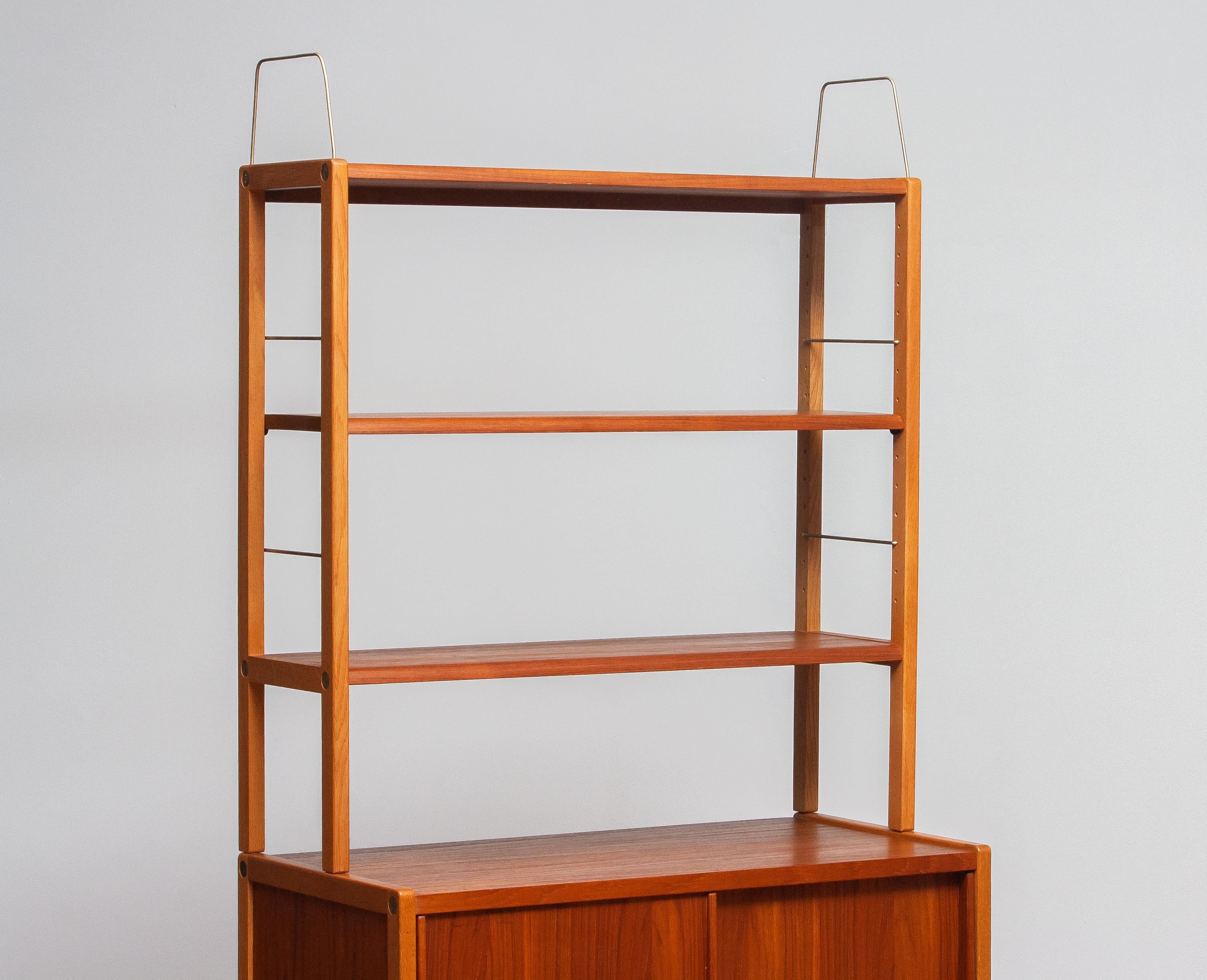 Swedish 1960, 1 Teak / Oak and Brass Bookcase by Bertil Fridhagen for Bodafors, Sweden
