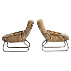 1960-1969 Czech Republic Warm Camel Boucle Pair Of Chrome-Frame Lounge Chairs