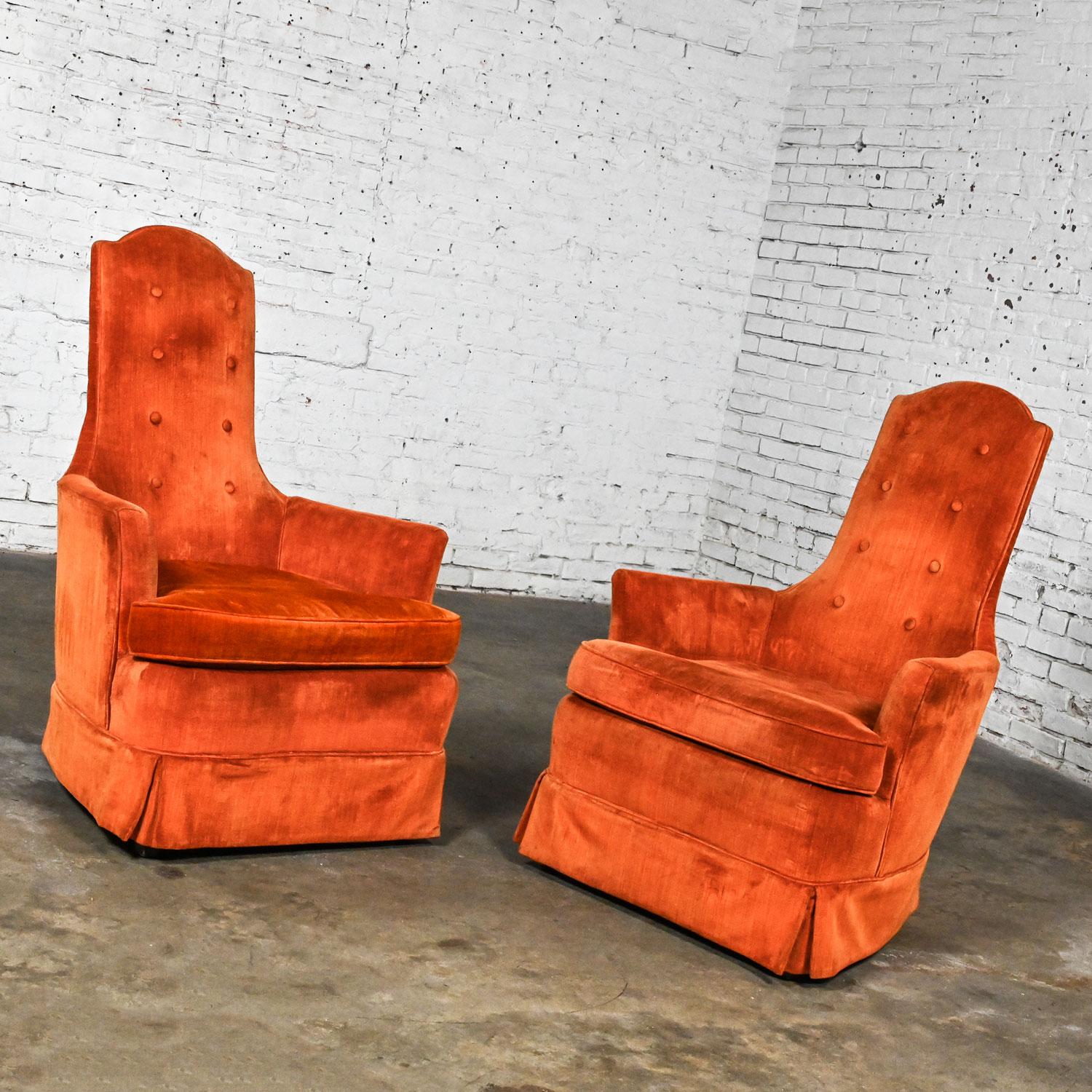 Stunning vintage Hollywood Regency lounge or club high back chairs with orange velvet fabric by Perfection Furniture, a pair. Beautiful condition, keeping in mind that these are vintage and not new so will have signs of use and wear. There is a tiny