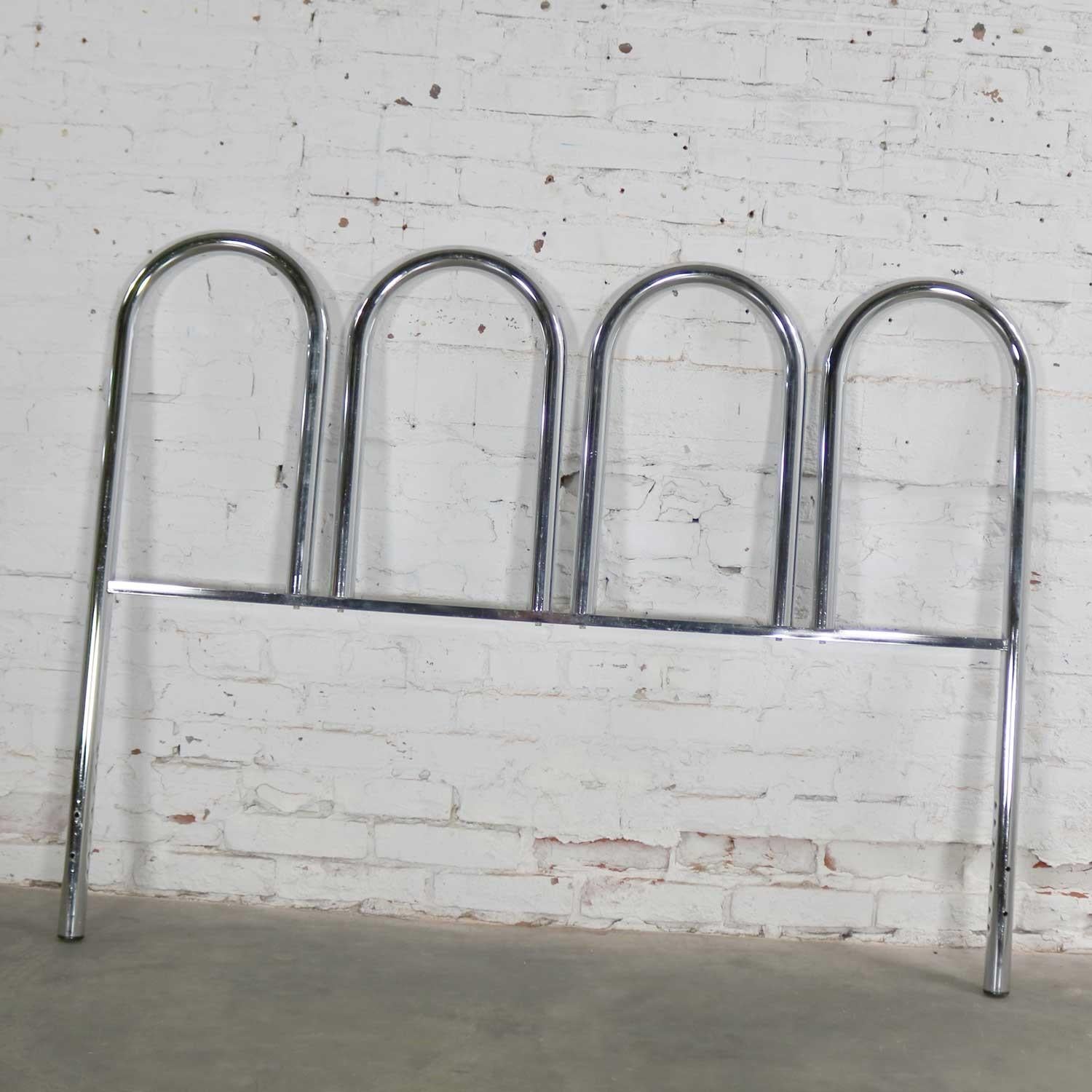 Marvelous vintage Mid-Century Modern four arch chrome tube full-size headboard. Beautiful condition, keeping in mind that this is vintage and not new so will have signs of use and wear even if it has been refinished or restored. Specifically, there