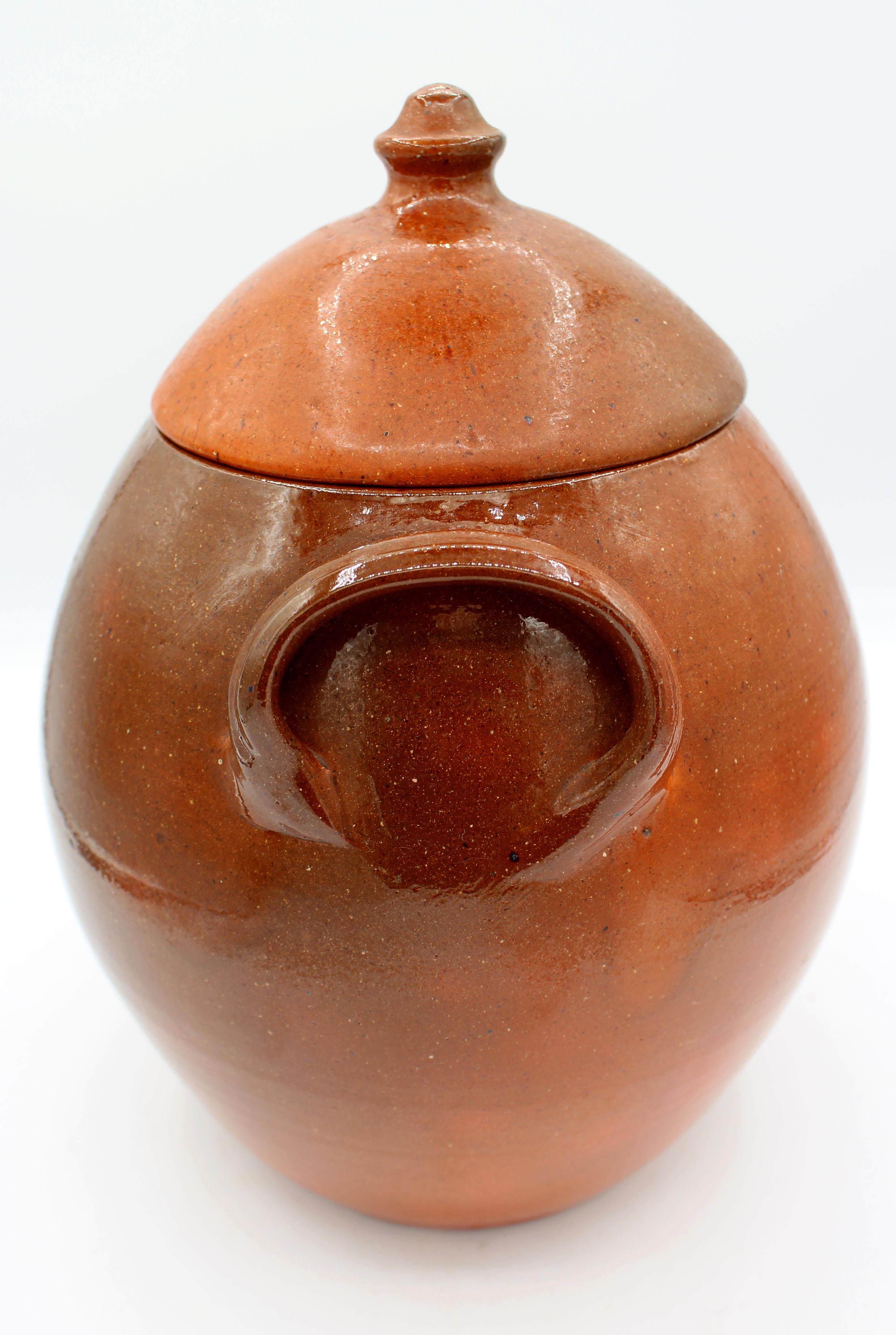 American 1960-1972 Pumpkin Glazed Double-Handled Lidded Pottery Jar by Ben Owen I For Sale