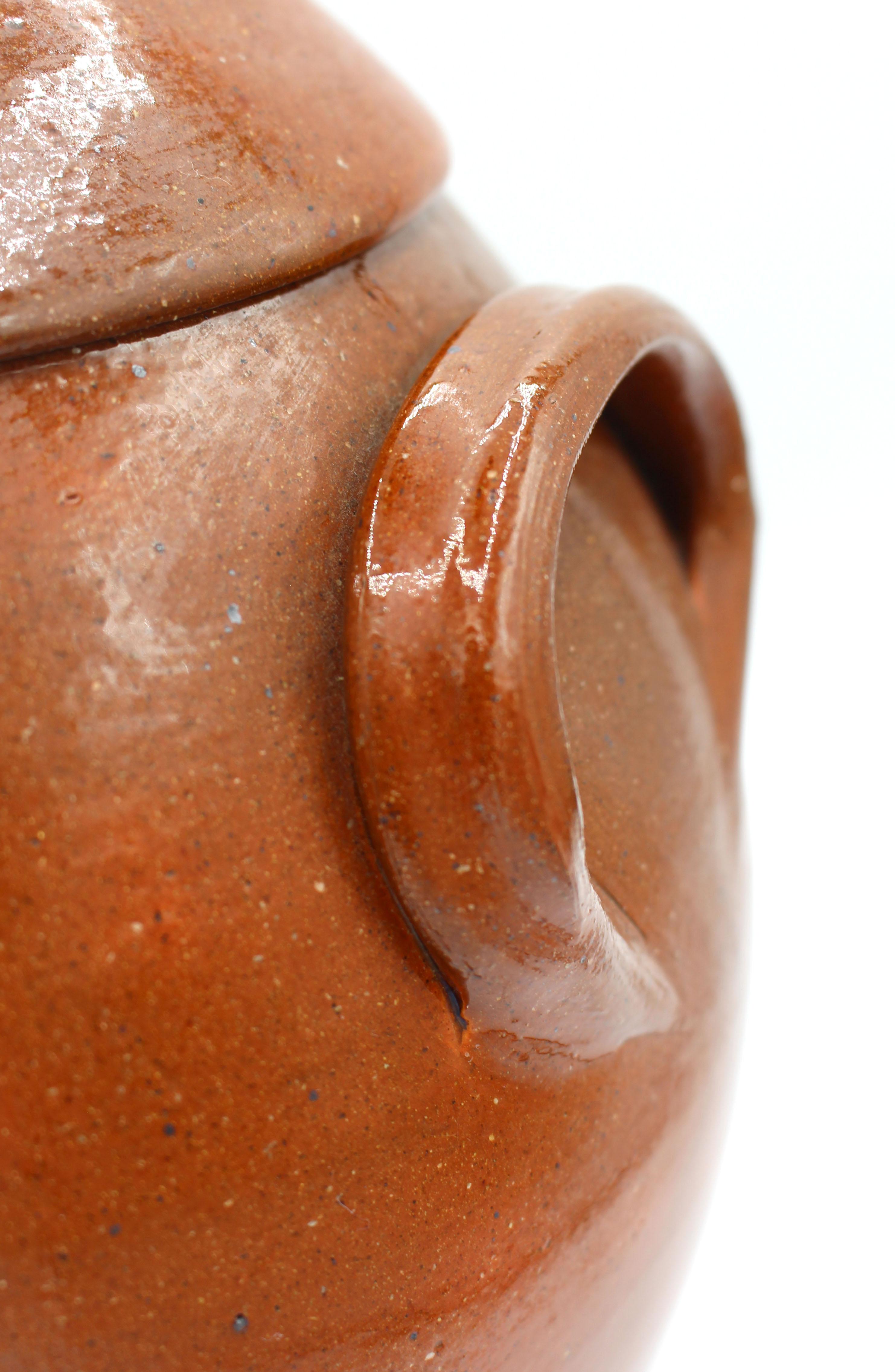 1960-1972 Pumpkin Glazed Double-Handled Lidded Pottery Jar by Ben Owen I In Good Condition For Sale In Chapel Hill, NC