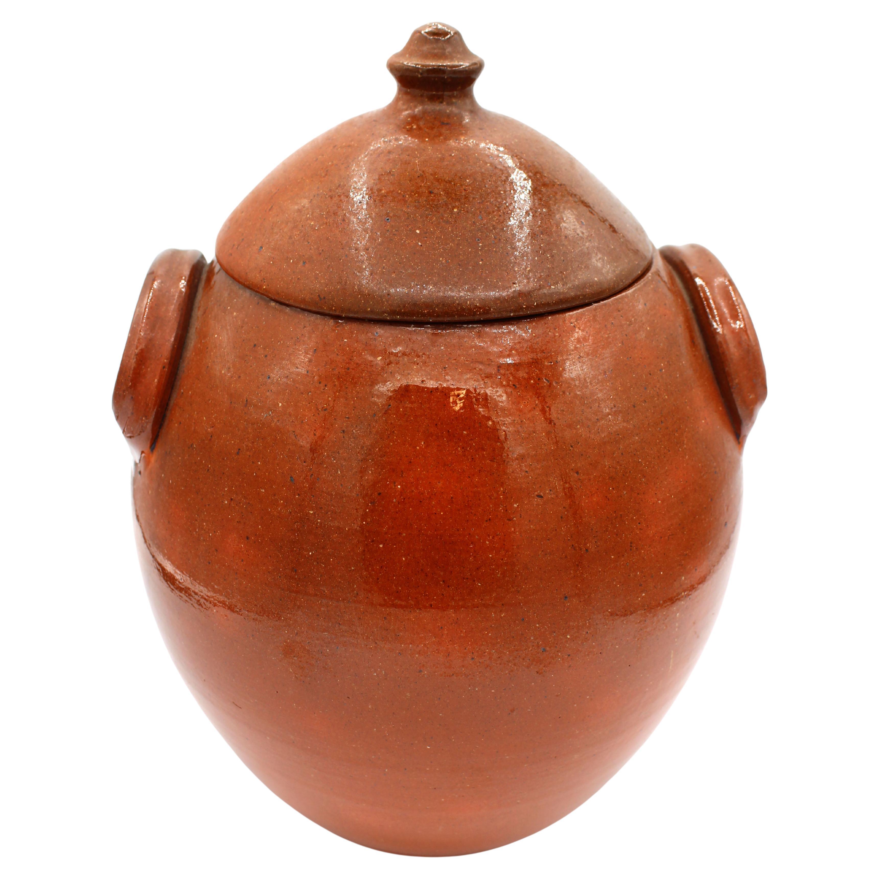 1960-1972 Pumpkin Glazed Double-Handled Lidded Pottery Jar by Ben Owen I For Sale
