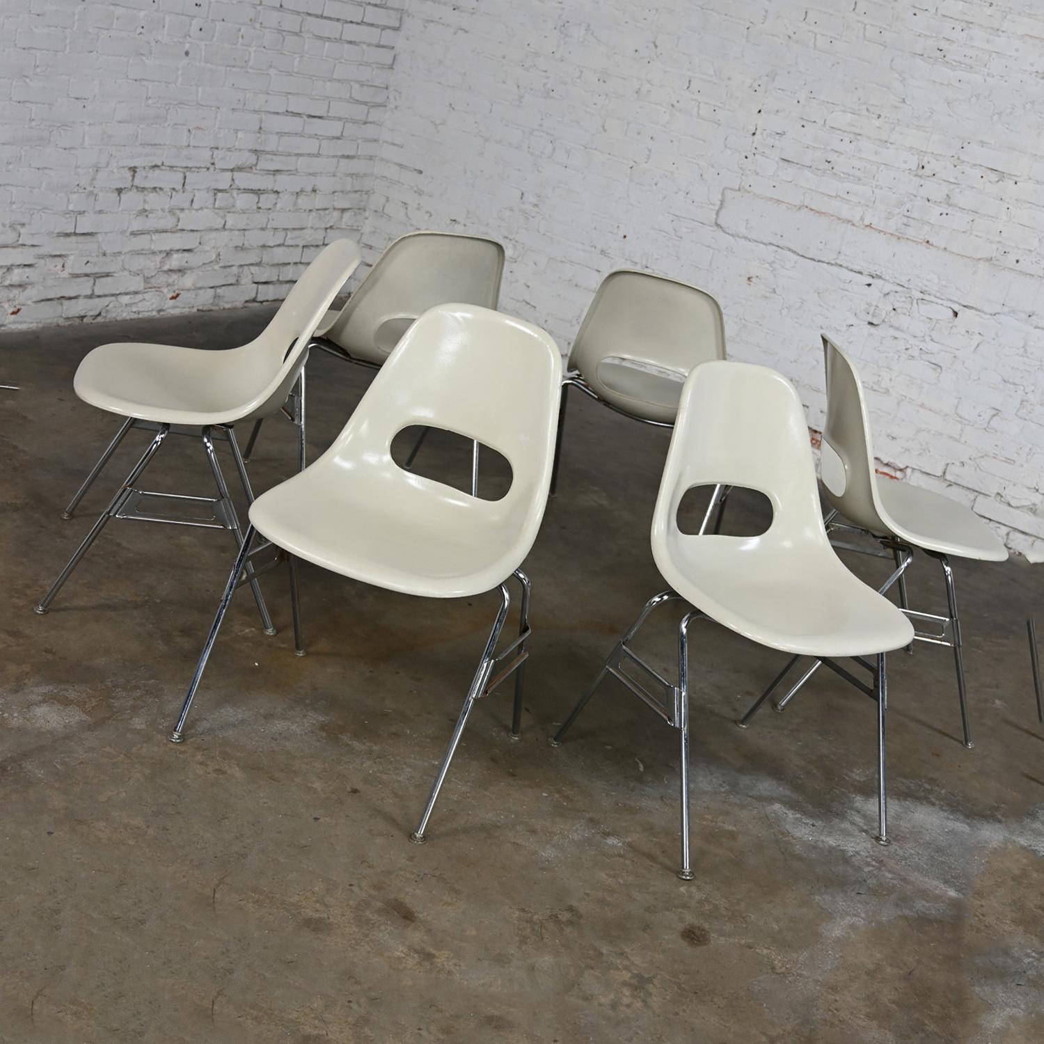 Handsome vintage Mid-Century Modern Krueger International white molded fiberglass shells & chrome tube base stacking chairs, set of 6. Beautiful condition, keeping in mind that these are vintage and not new so will have signs of use and wear even if