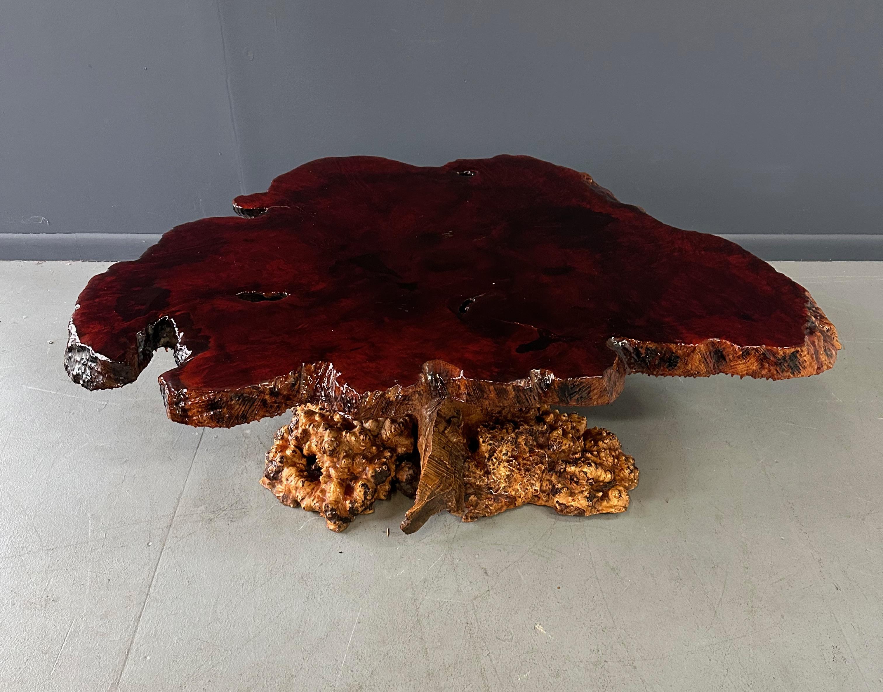 Crafted from beautiful, rare California Redwood Burl, this mid-century table boasts a timeless design that is as unique as it is durable. A statement piece for any home, this vintage table adds a touch of natural beauty and warmth to any space.