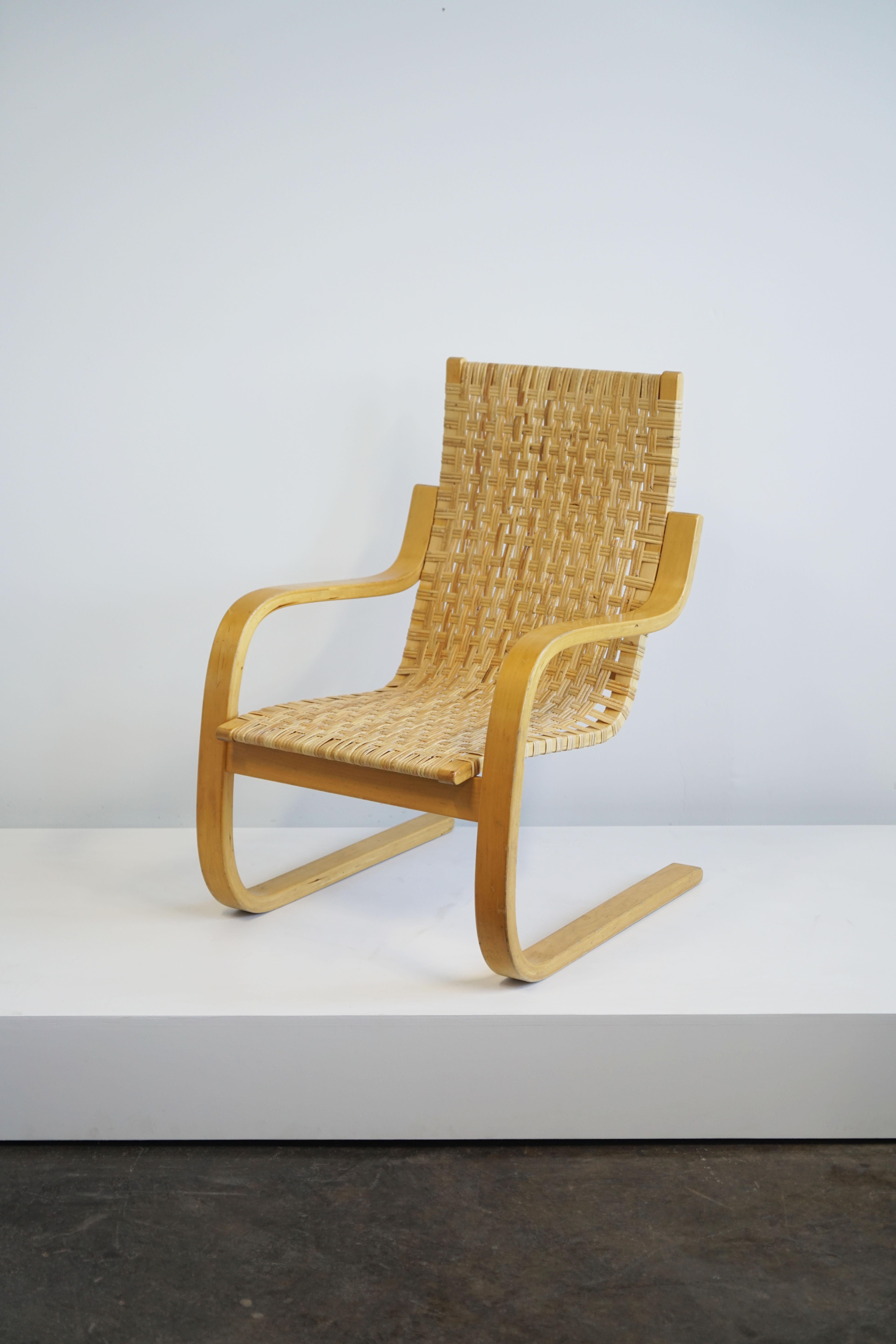 Alvar Aalto, cantilevered chair model 406. 
Laminated birch, cane.
circa 1960

The model 406 chair was originally designed in 1938-39. 
Measures: 35