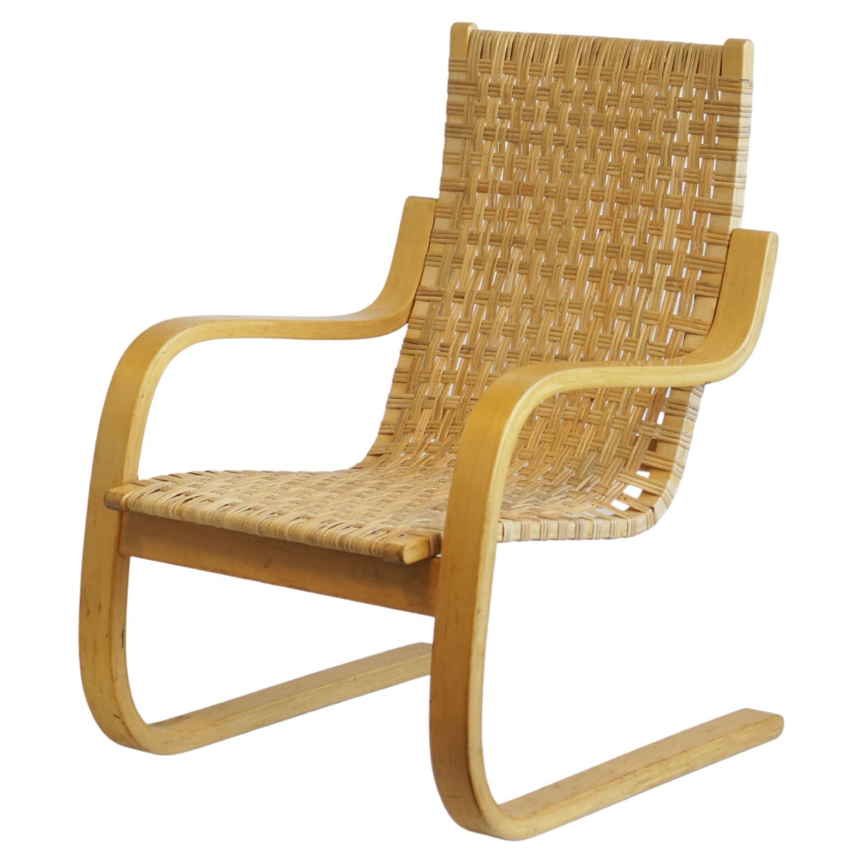 1960 Alvar Aalto Cantilever Chair Model 406 by Artek in Birch and Cane Webbing