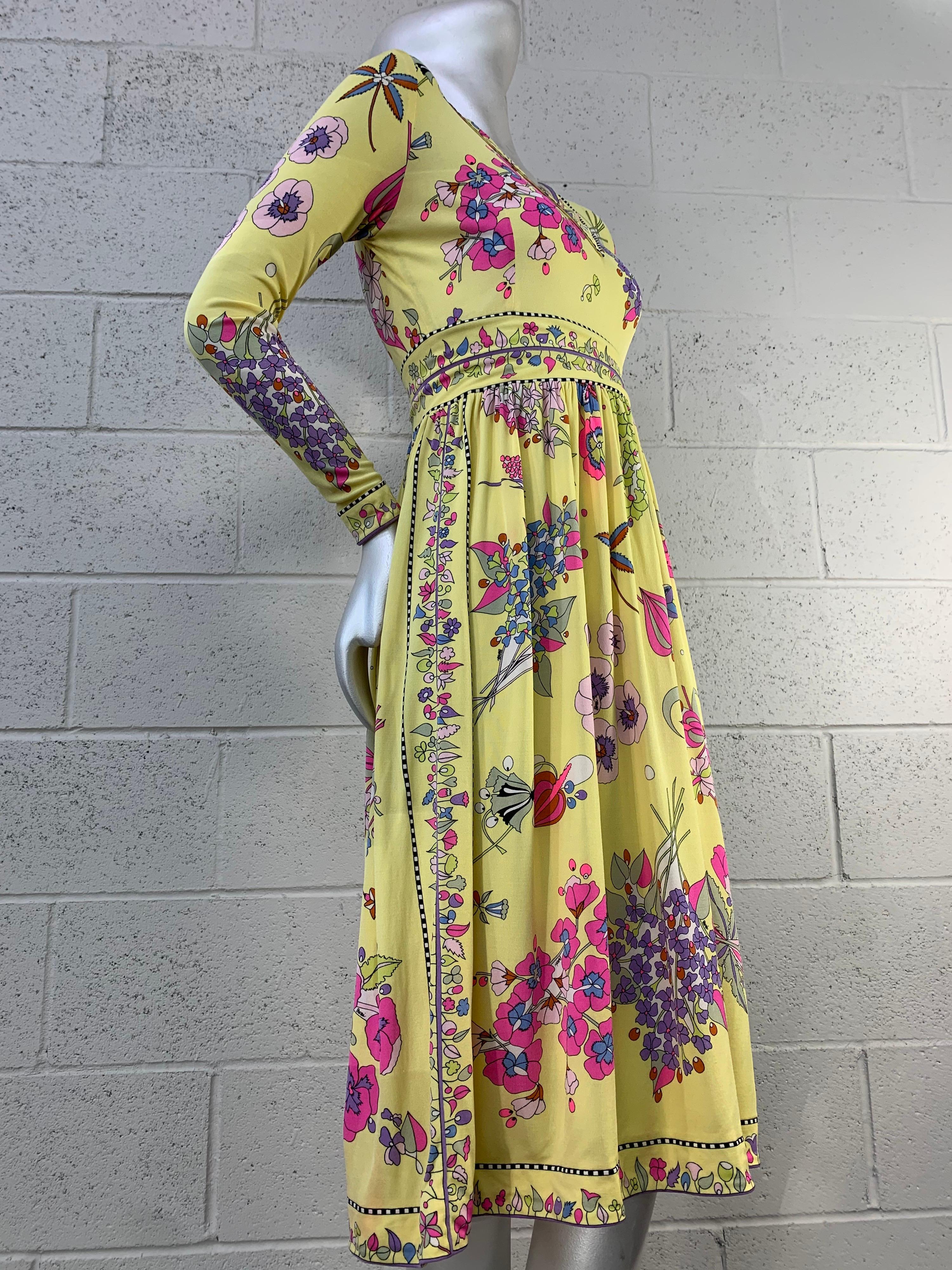 A gorgeous 1960s Bessi silk jersey psychedelic floral bouquet Pucci-esque print Mod dress in stunning spring colors of yellow, pink and purple with fitted long sleeves and bodice. Flared skirt for glamorous movement. Back zipper. Size 4-6. 