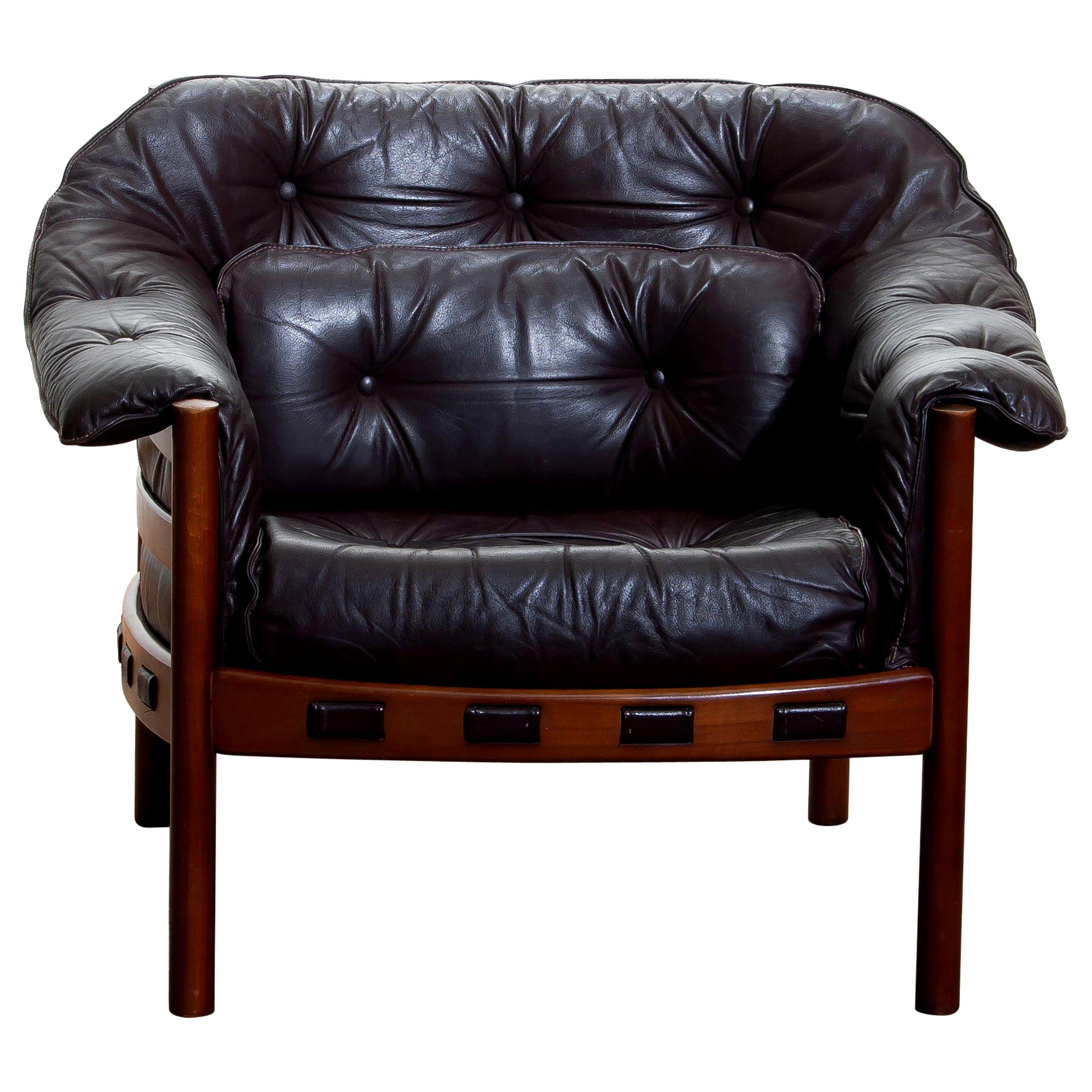 1960s brown leather lounge chair with designed by Arne Norell for Coja, Sweden.
This lounge chair is in, overall, good condition.
  