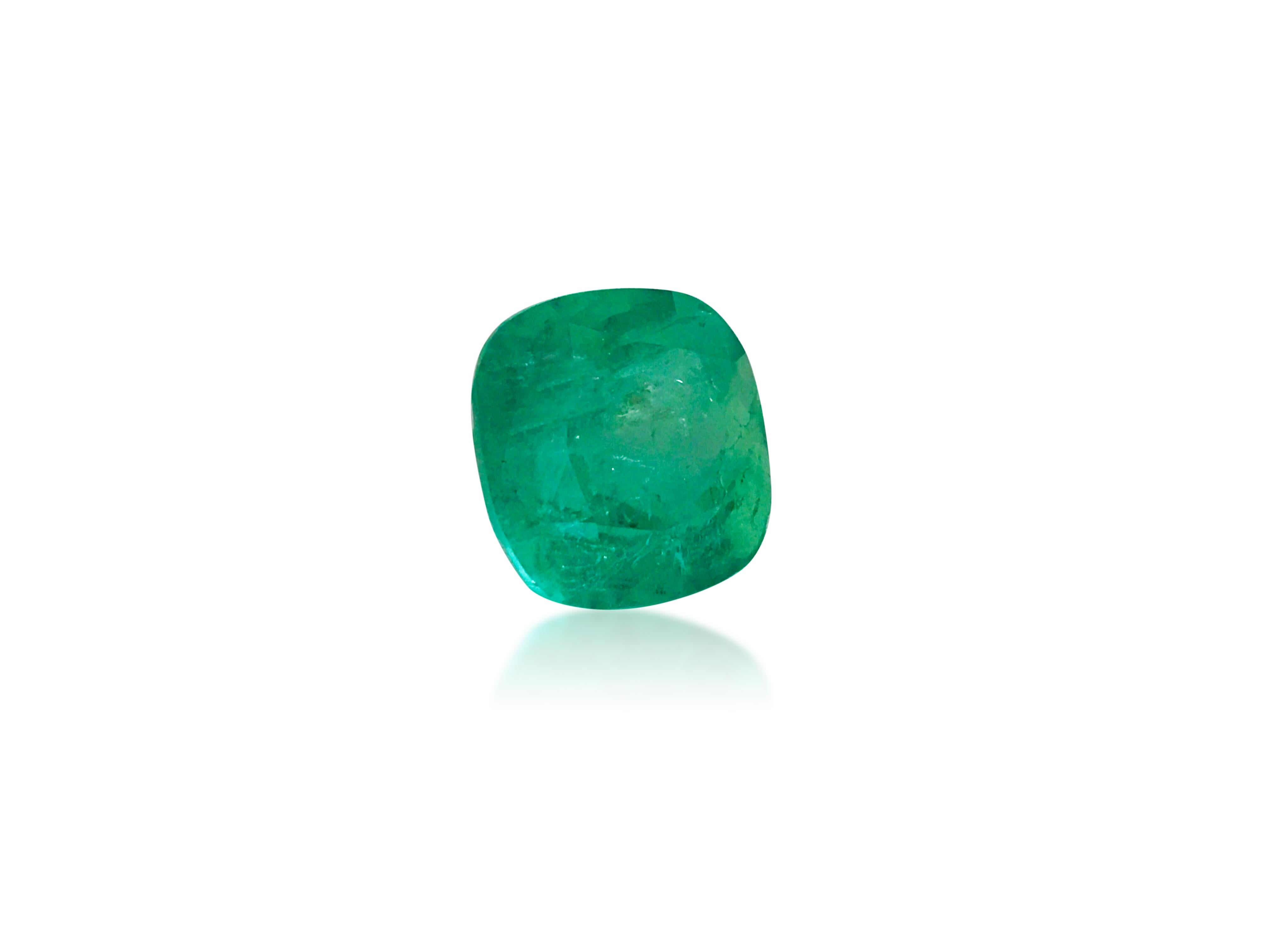 This superb loose emerald boasts a remarkable 19.60 carats and features a stunning cushion cut, measuring 6.20 x 5.80 mm. With its deep color and intense green hue, this natural earth-mined emerald exhibits vivid saturation and exceptional shine.