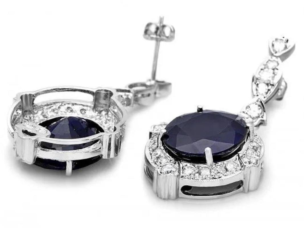 19.60 Carats Natural Sapphire and Diamond 18K Solid White Gold Earrings

Total Natural Sapphire Weight: Approx. 17.90 Carats

Sapphire Treatment: Diffusion

Sapphire Measure: Approx. 15 x 12 mm

Total Natural Round Diamonds Weight: Approx. 1.70