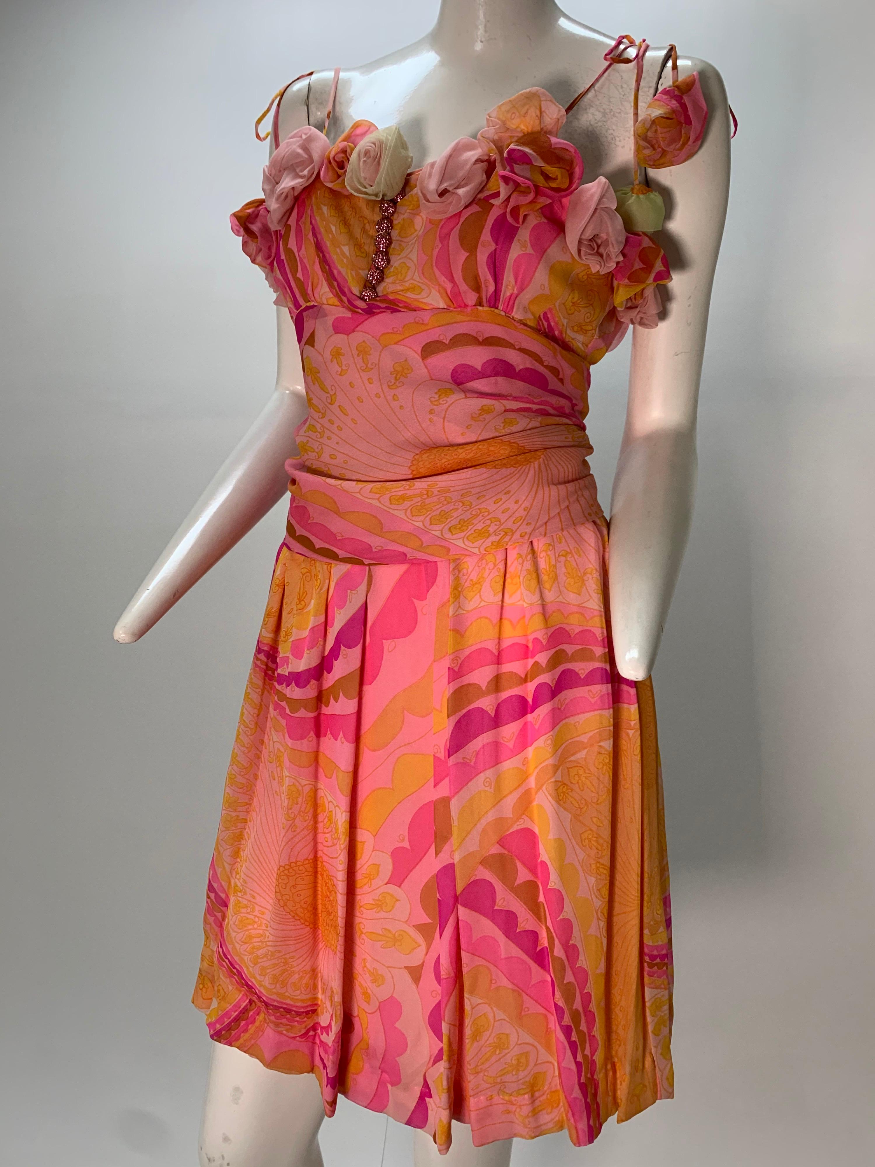 1960s Ceil Chapman silk chiffon psychedelic print cocktail dress with applied handmade roses. Spaghetti string ties at shoulder, fitted ruched waist and skirt cropped at the knee. Fully lined. Zipper at back. This lovely dress has been re-worked by