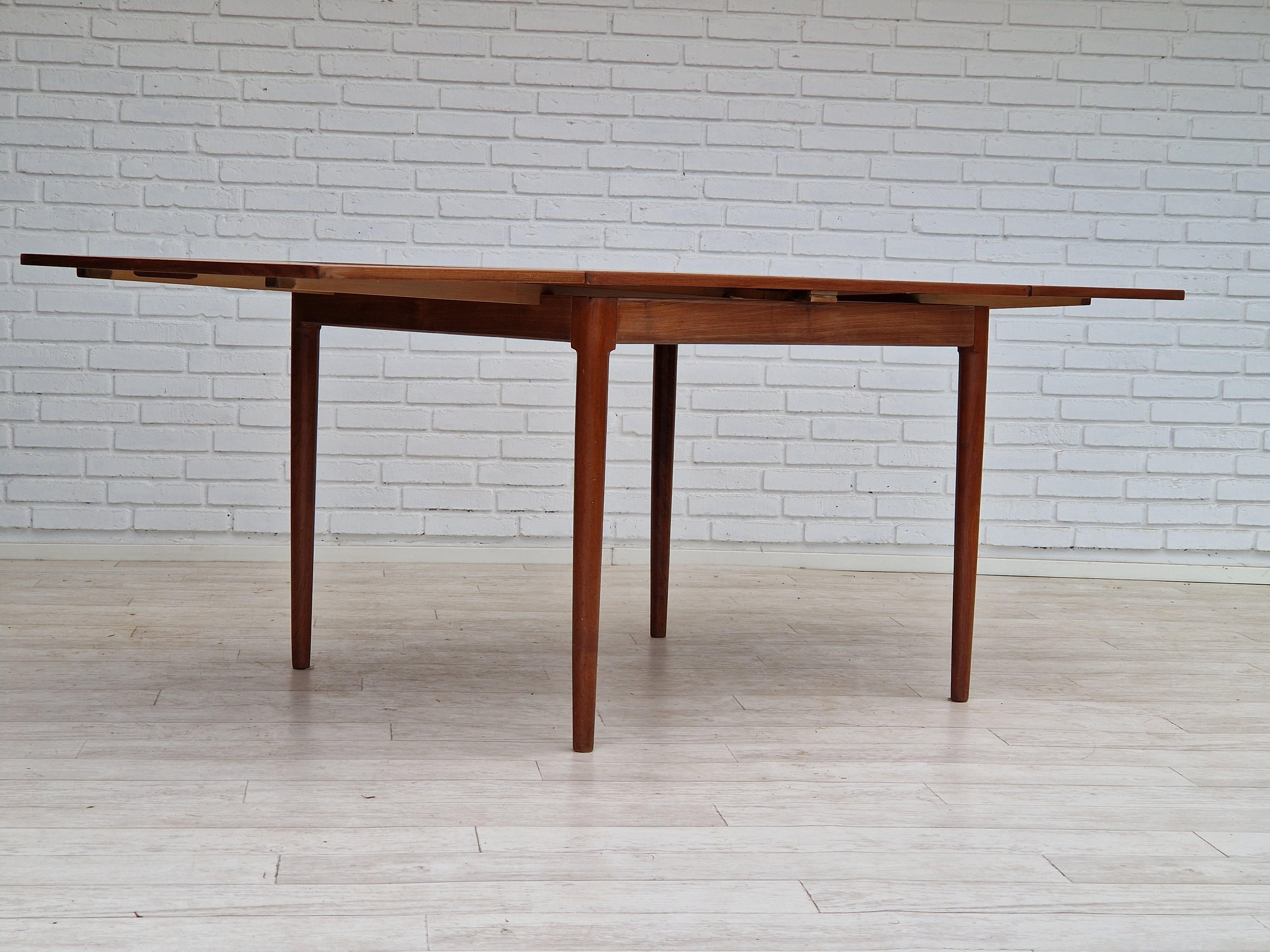 Scandinavian Modern 1960, Danish design, unfolded dining table, teak wood.