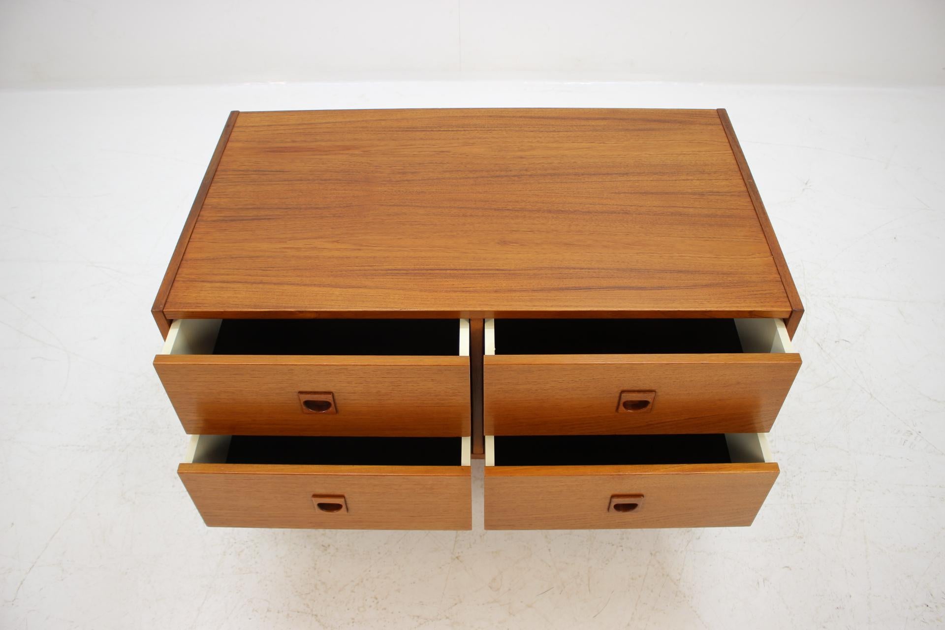 This commode features four drawers. The item was carefully refurbished.