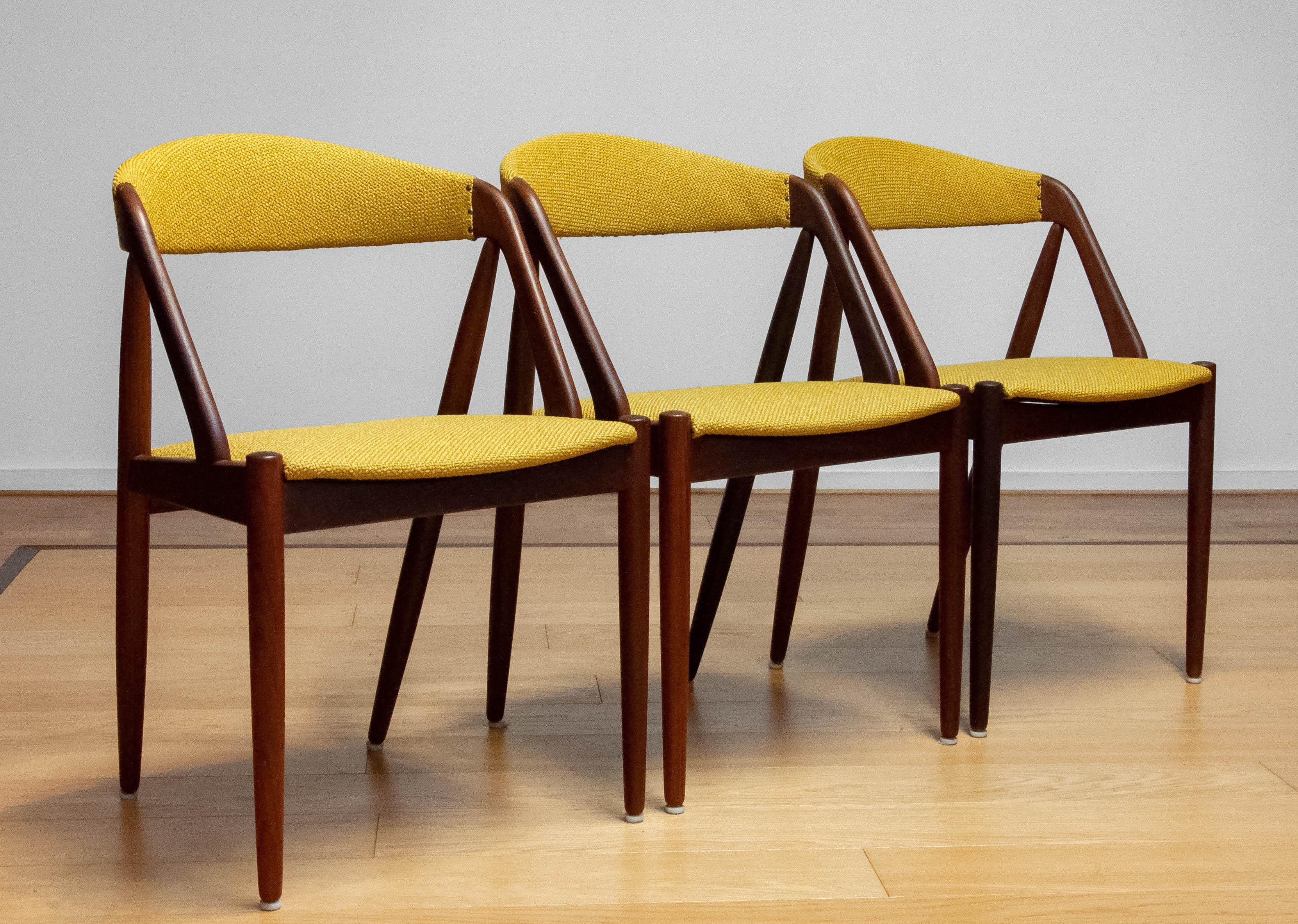 Beautiful dining chair designed by Kai Kristiansen for Shou-Andersen Møbelfabrik in Denmark 1960s.
The chairs are reupholstered in our workshop with the current yellow ochre fabric. The frames are teak and the chairs are in Wonderfull