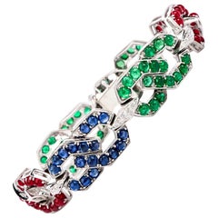 1960 Diamond Sapphire Emerald and Ruby 18 Karat Gold Link Bracelet