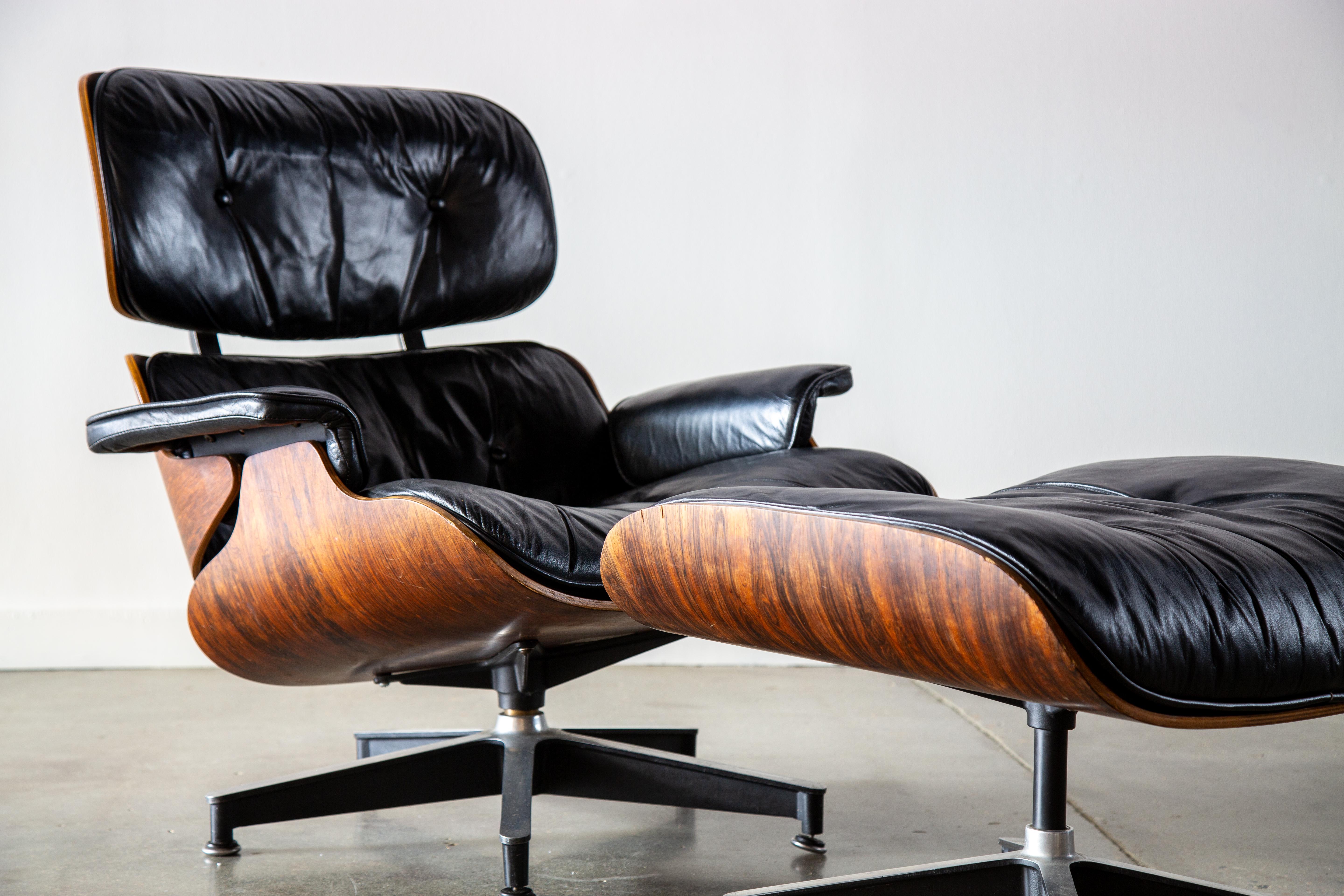 Mid-Century Modern 1960 Eames for Herman Miller 670 and 671 Black leather chair and ottoman 3 screw