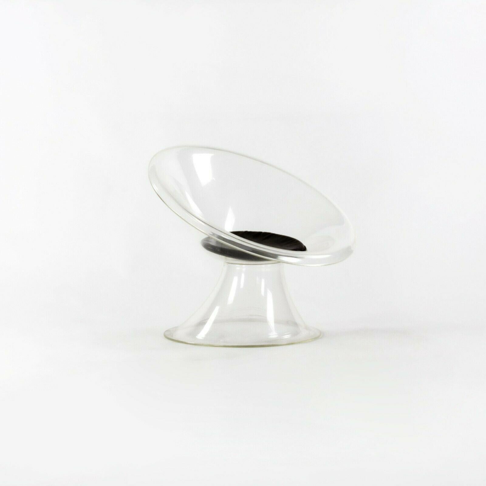 Listed for sale is a rare Buttercup chair from The Invisible Group, designed by Erwine and Estelle Laverne from Laverne Originals. The Buttercup chair is constructed from lucite, a type of acrylic that the Laverne's used experimentally in their