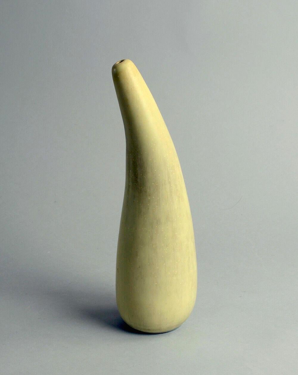 This unique stoneware vase by the great Swedish ceramist Stig Lindberg has a lovely asymmetrical organic form and a gorgeous matte glaze. Made at the Gustavsberg Studio in 1960.

Measures: 9 3/4