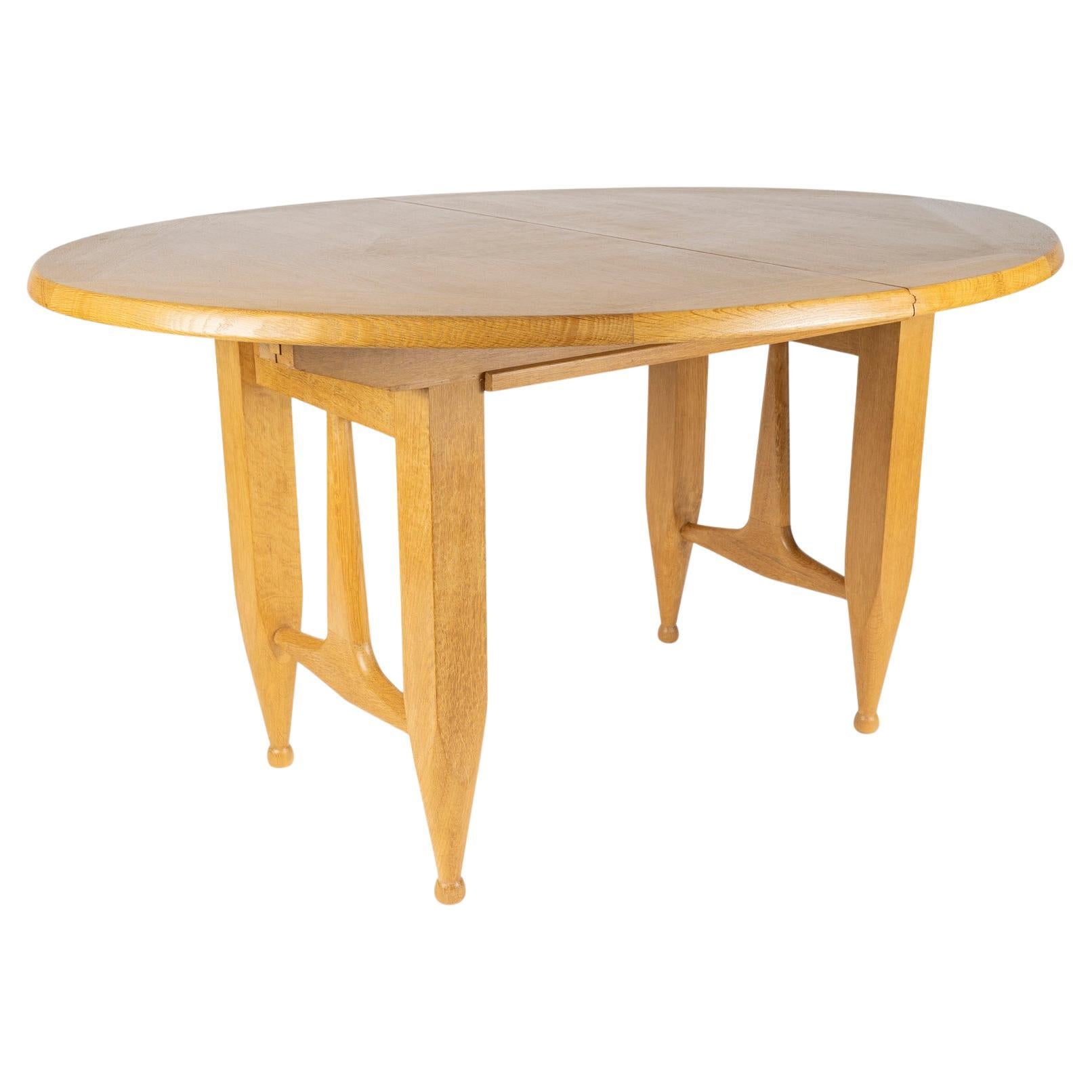 1960 Guillerme y Chambron, mesa extensible de roble, edición Votre Maison
