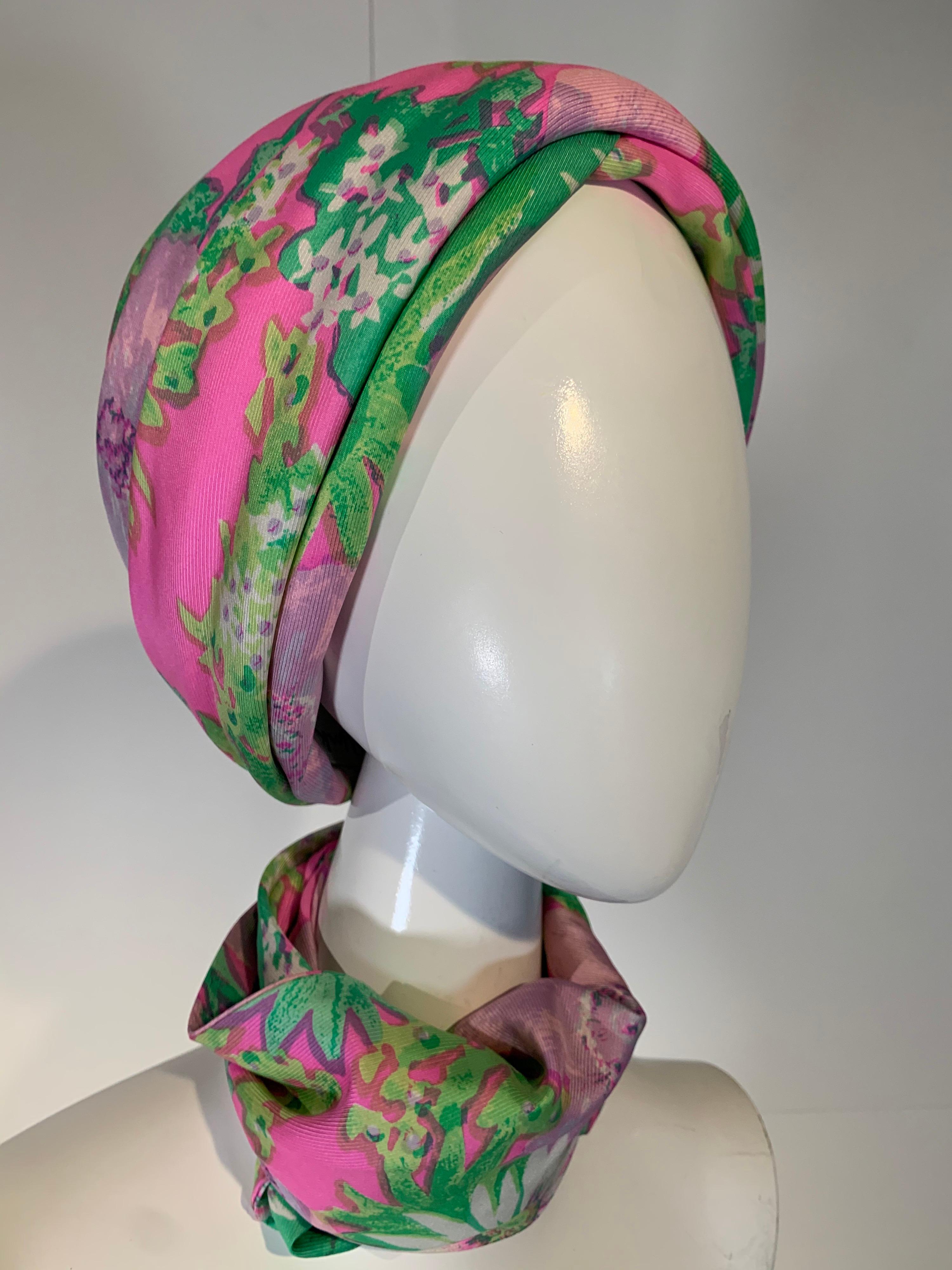 1960 Irene of New York fluorescent floral print turban hat and matching foulard / neck scarf ensemble: In shades of pink, lavender and green. Size Medium. Originally sold at I. Magnin. 
