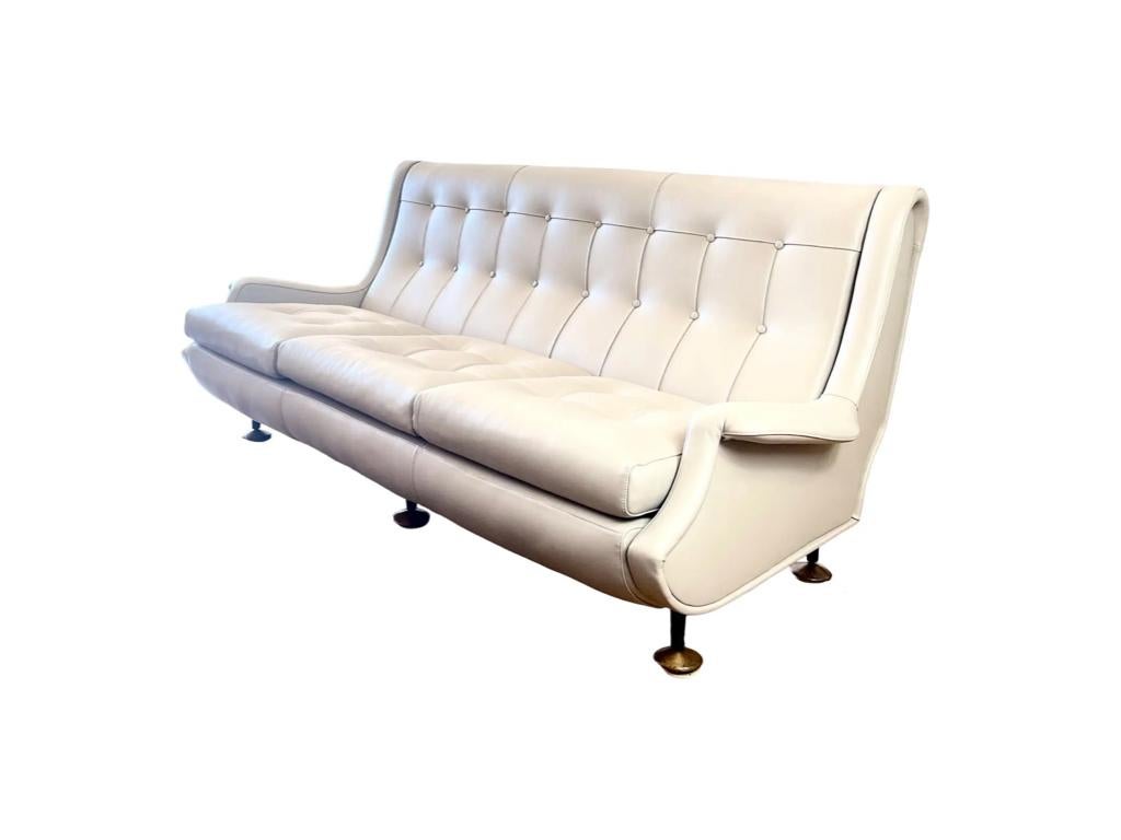 Introducing the authentic and iconic ''Regent'' sofa, crafted by the esteemed historic brand Arflex in the 1960s and designed by the renowned architect Marco Zanuso. Immerse yourself in the timeless elegance of this meticulously restored vintage