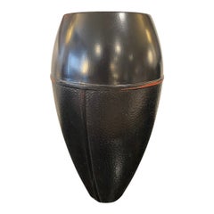 Vintage 1960 Japanese Black Metal Vase Featuring A Narrow Base