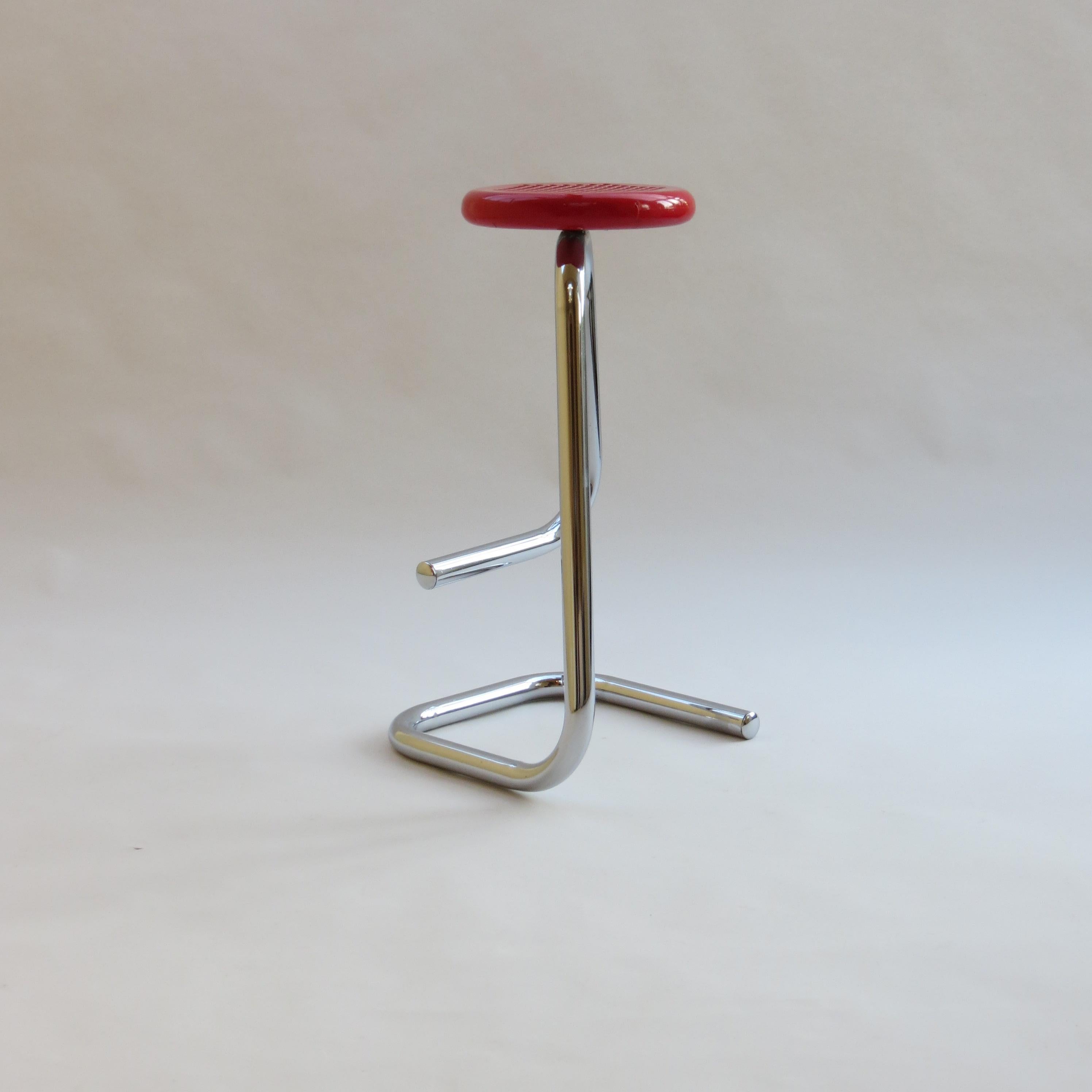 An original paperclip stool, designed by Hugh Hamilton and Philip Salmon and manufactured by Kinetics in 1969. In original condition, cantilever design solid chrome base and red resin seat.

In good vintage condition. The stool retains the