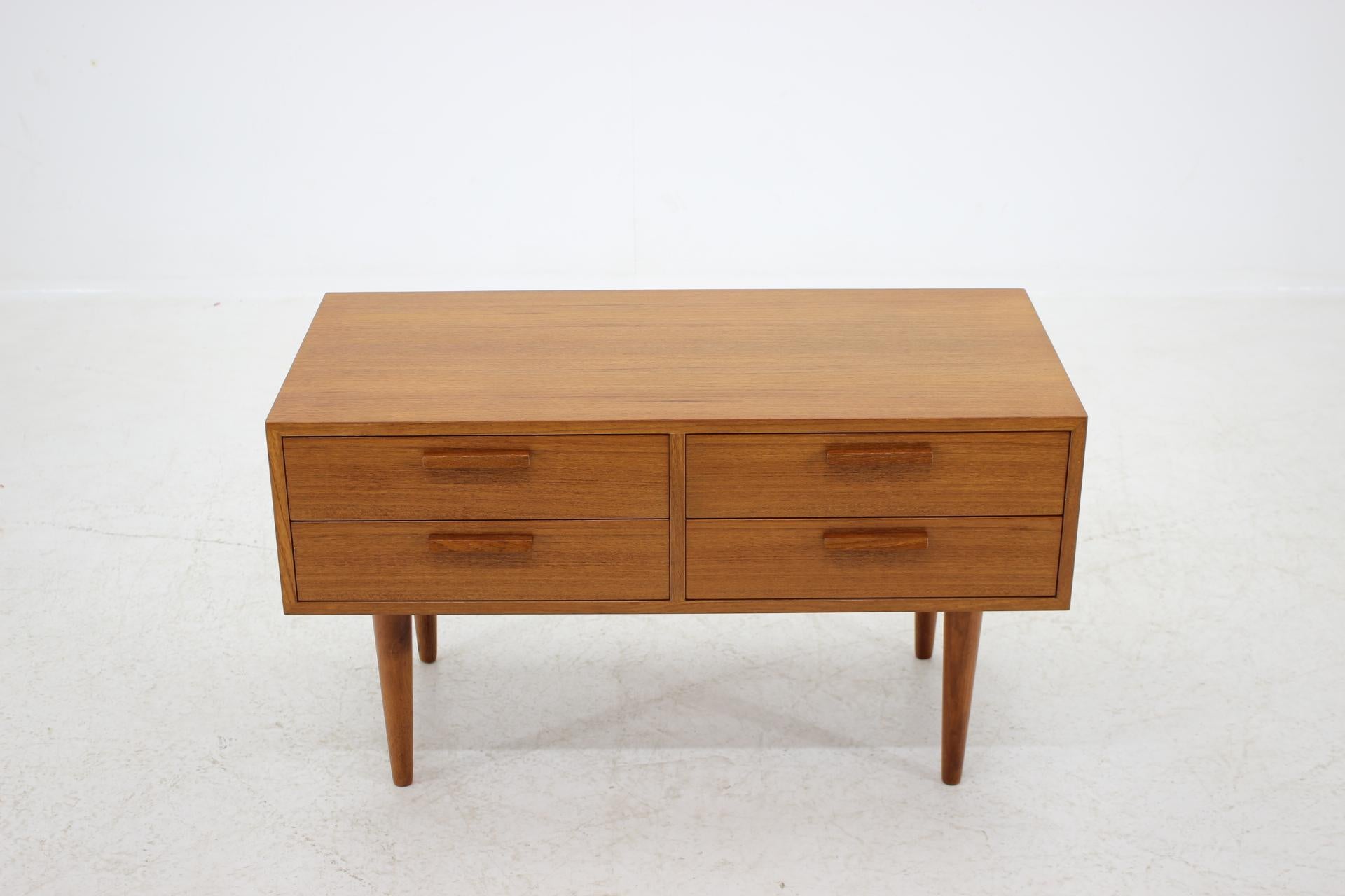 This commode features four drawers. The item was carefully refurbished.