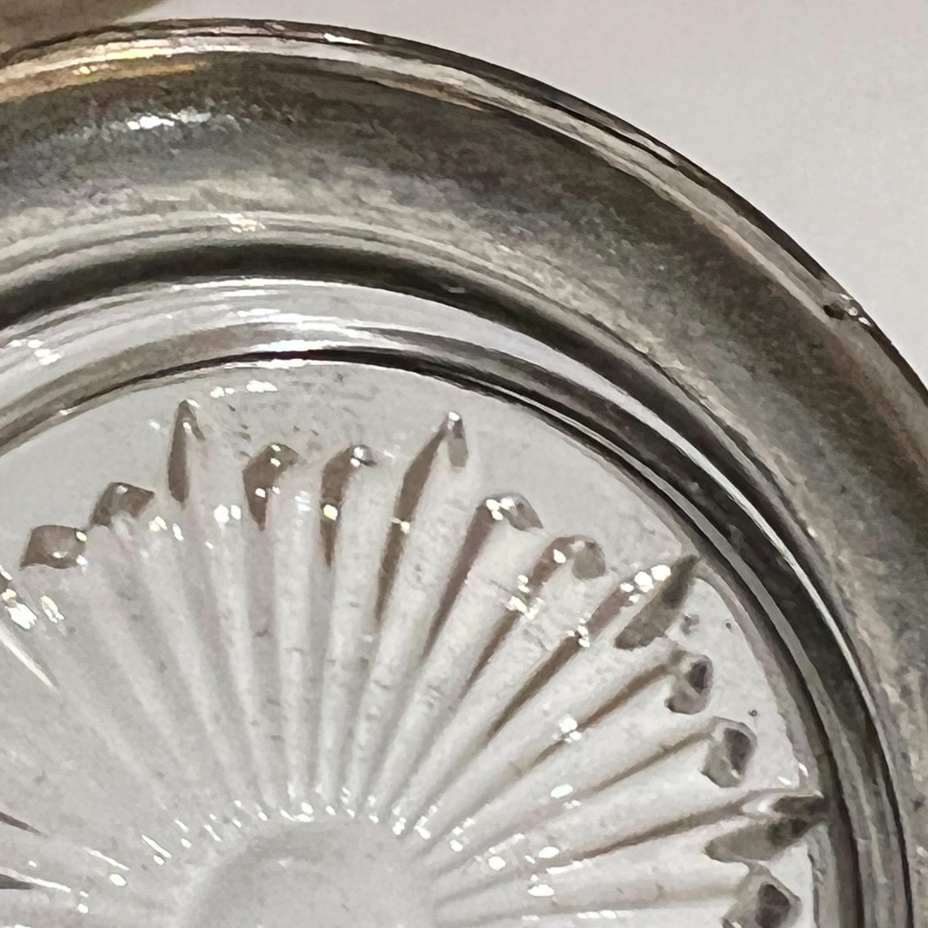 Italian glass ashtray 
1960 Leonard Italy Sunburst round ashtray coaster catchall jewelry tray in silverplate & crystal glass
No label, maker Leonard Italy
Measures: .75 tall x 4 diameter
Preowned original vintage condition unrestored.
See images