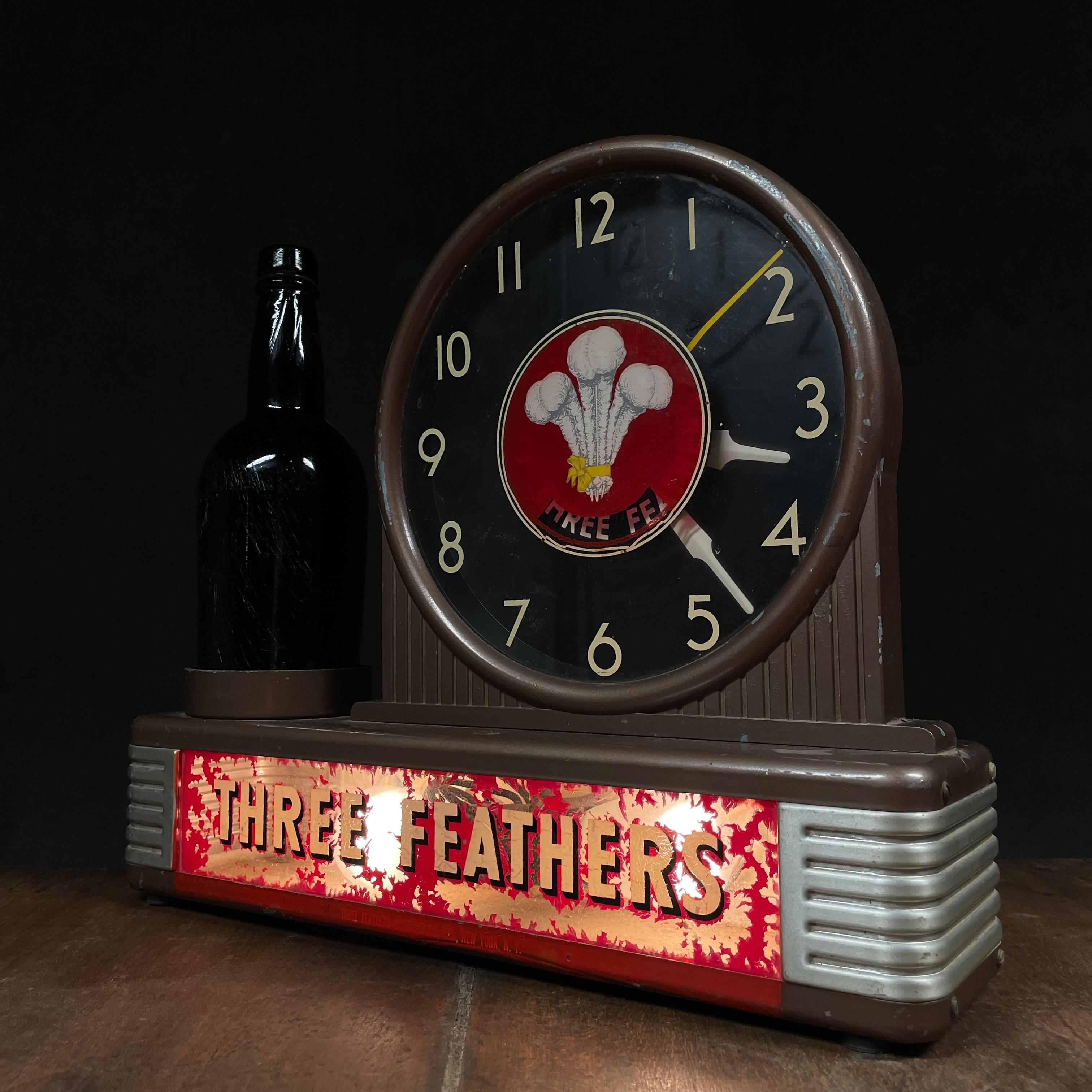 Metal 1960 light up three feathers whiskey sign by Schenley For Sale