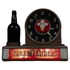 Used 1960 light up three feathers whiskey sign by Schenley