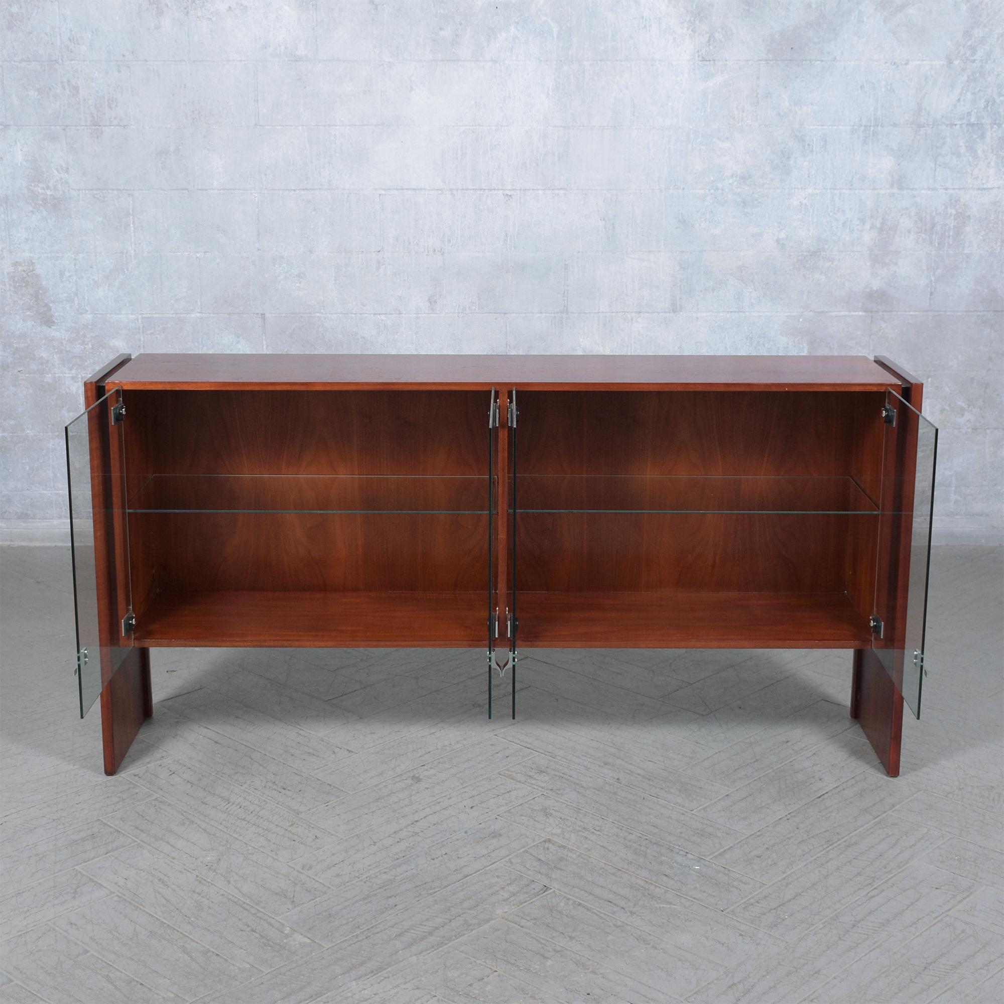 Immerse yourself in the classic allure of the 1960s with our beautifully restored Mahogany Cabinet, a stellar example of mid-century craftsmanship. Crafted from premium mahogany wood, this piece has been expertly revitalized by our skilled