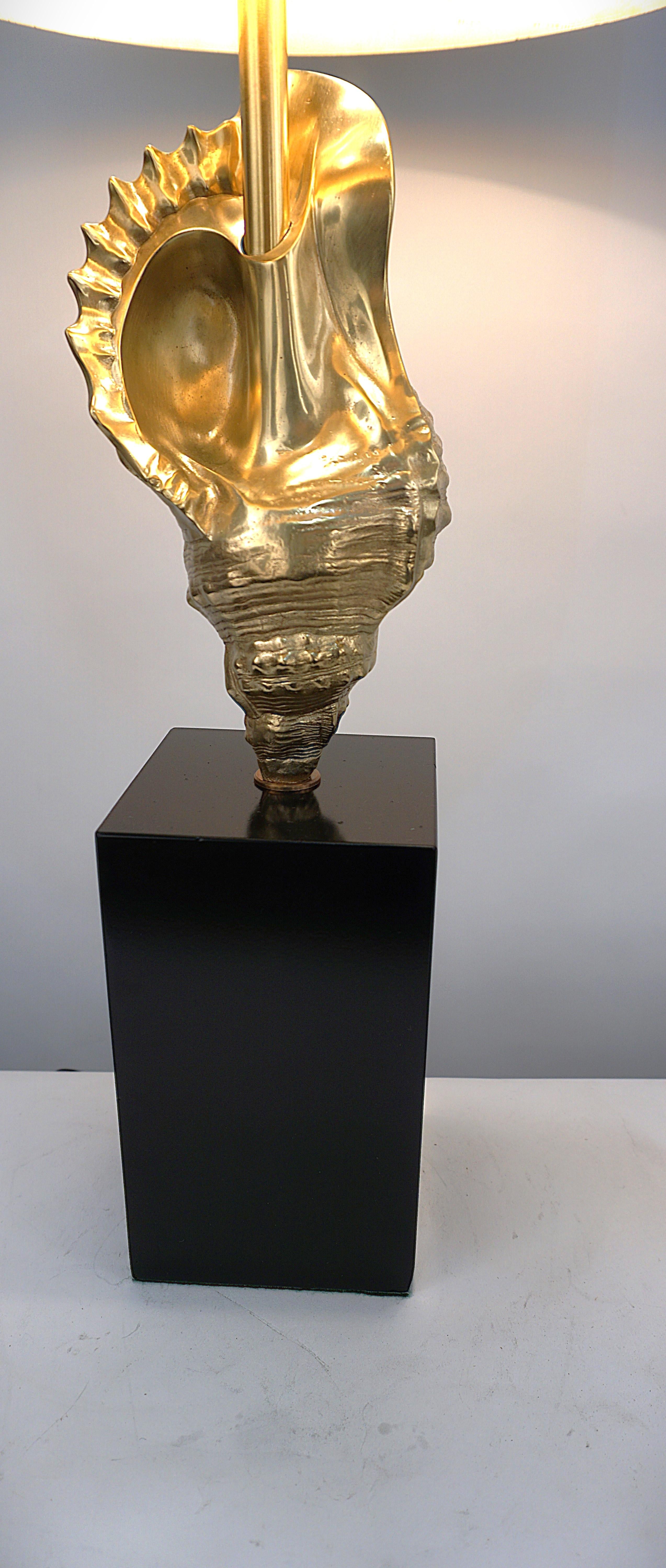 1960's bronze shell design over cubic black finish stone with bronze drum shade table lamp by Maison Charls.
New wiring with 3 lights, 100 max each.