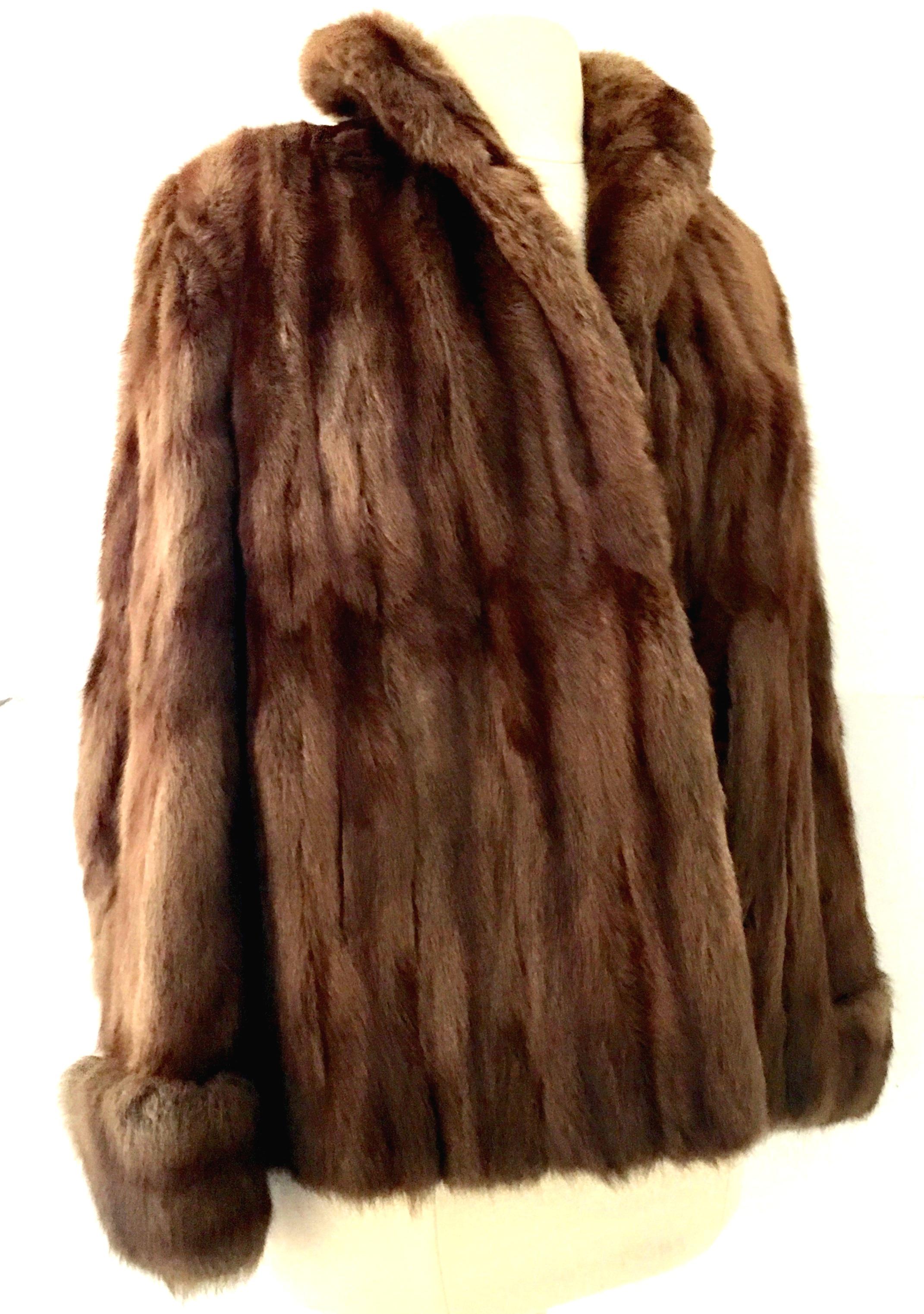 20th Century Gorgeous whiskey dyed Mink Fur jacket by, H.P. Wasson & Co. Indianapolis. Features a single breasted collar, two side pockets and cuff style sleeves. Fully lined with two front 