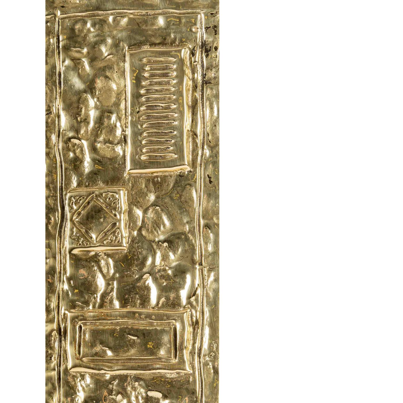 The mirror of rectangular form in height presents a border in gilded bronze decorated with geometrical cartridges in gilded bronze on all the height of the right part of the mirror.
It is signed on the facade in the lower part.