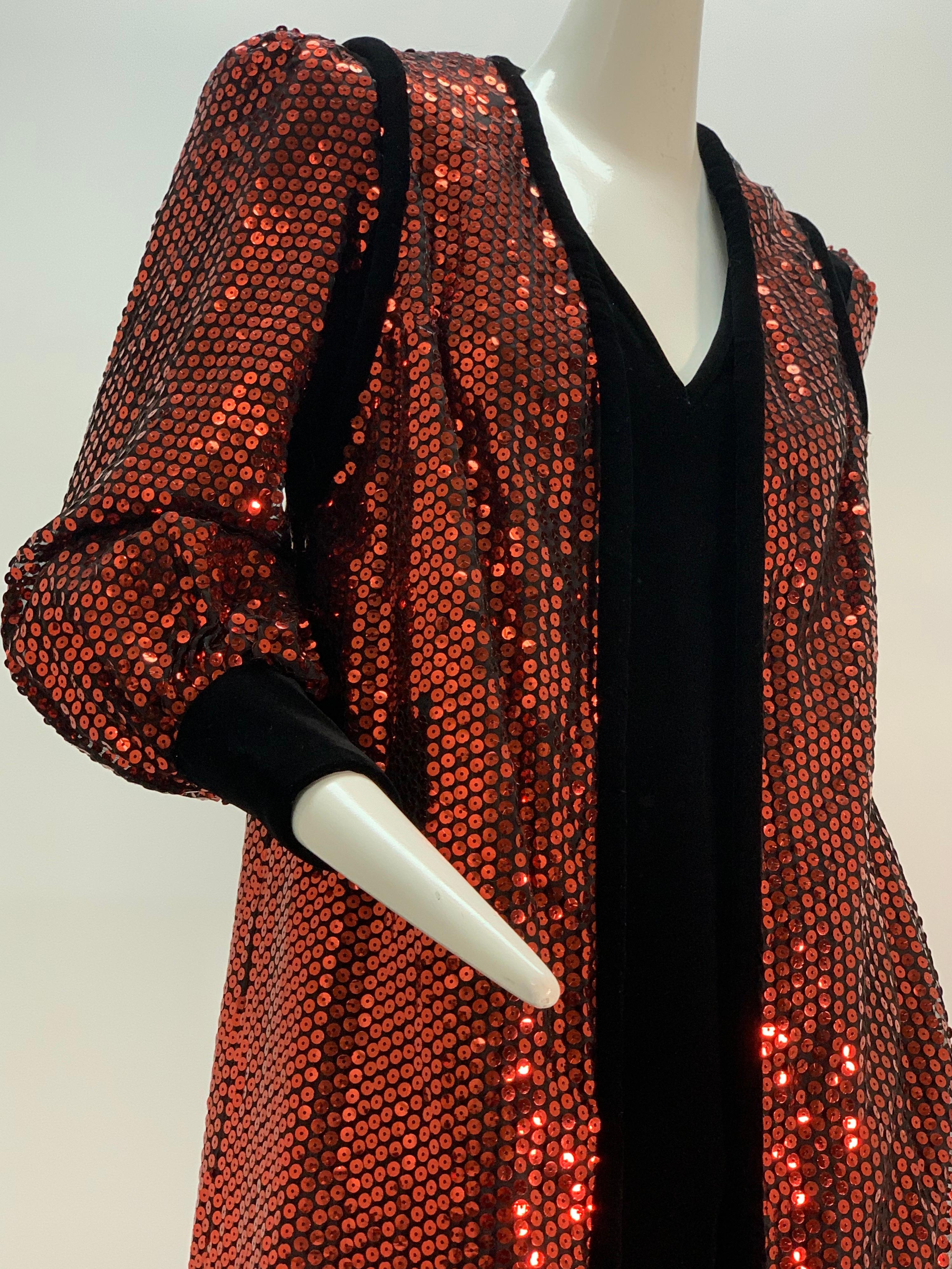 A fabulous 1960s Mr. Blackwell Custom crimson red sequin and black velvet gown and maxi vest ensemble: a gown of velvet with V-neck, puffed shoulders and blouson sleeves of sequins and banded velvet cuffs is paired with a maxi vest of sequins and