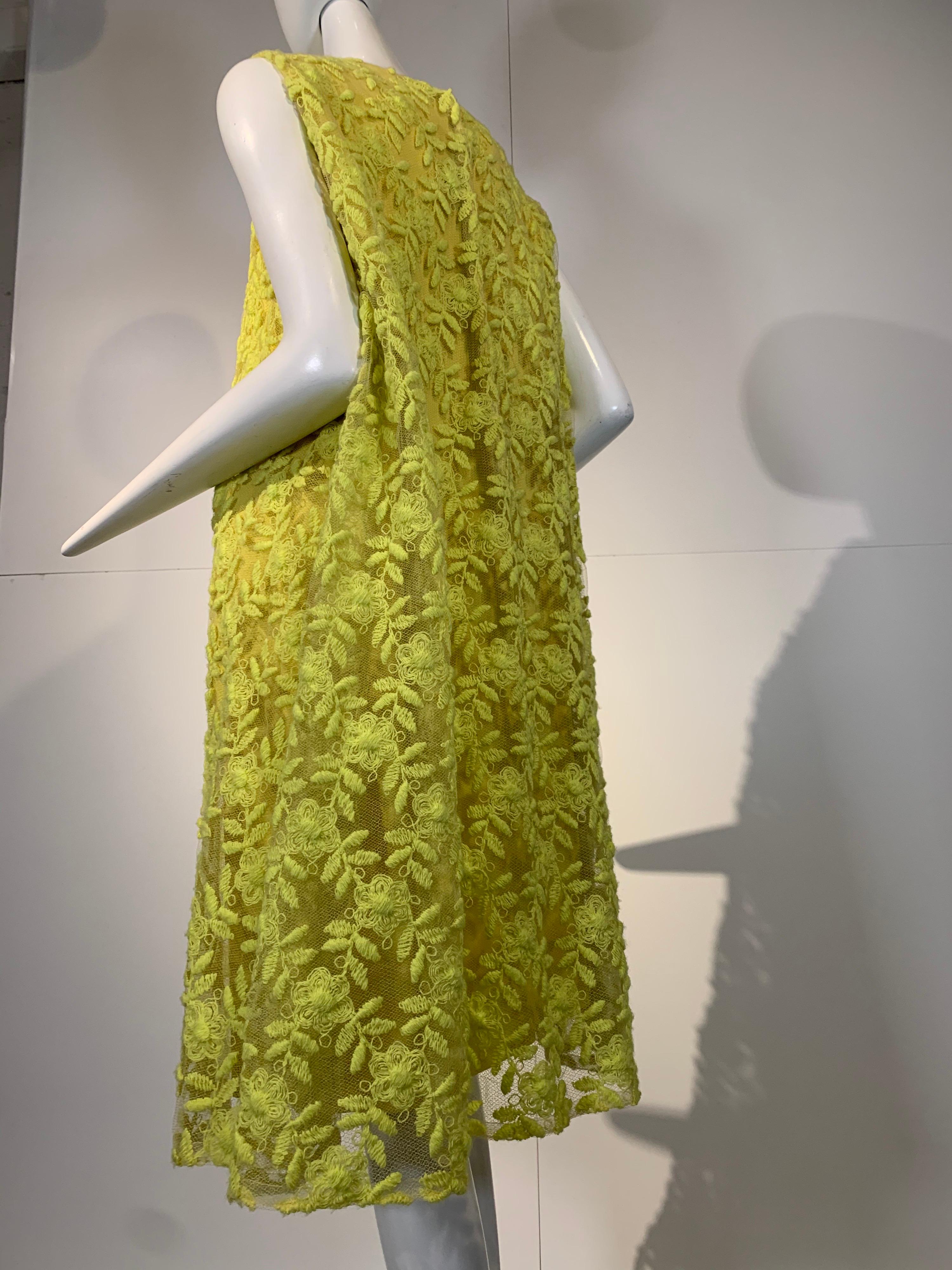 1960s Mr. Blackwell fluorescent yellow floral embroidered net cocktail dress. Under-layer is a sheath styled crepe dress and the over-layer of embroidered tulle is cut in a flowing trapeze style!  Really stunning and fun! Size 12 Modern.