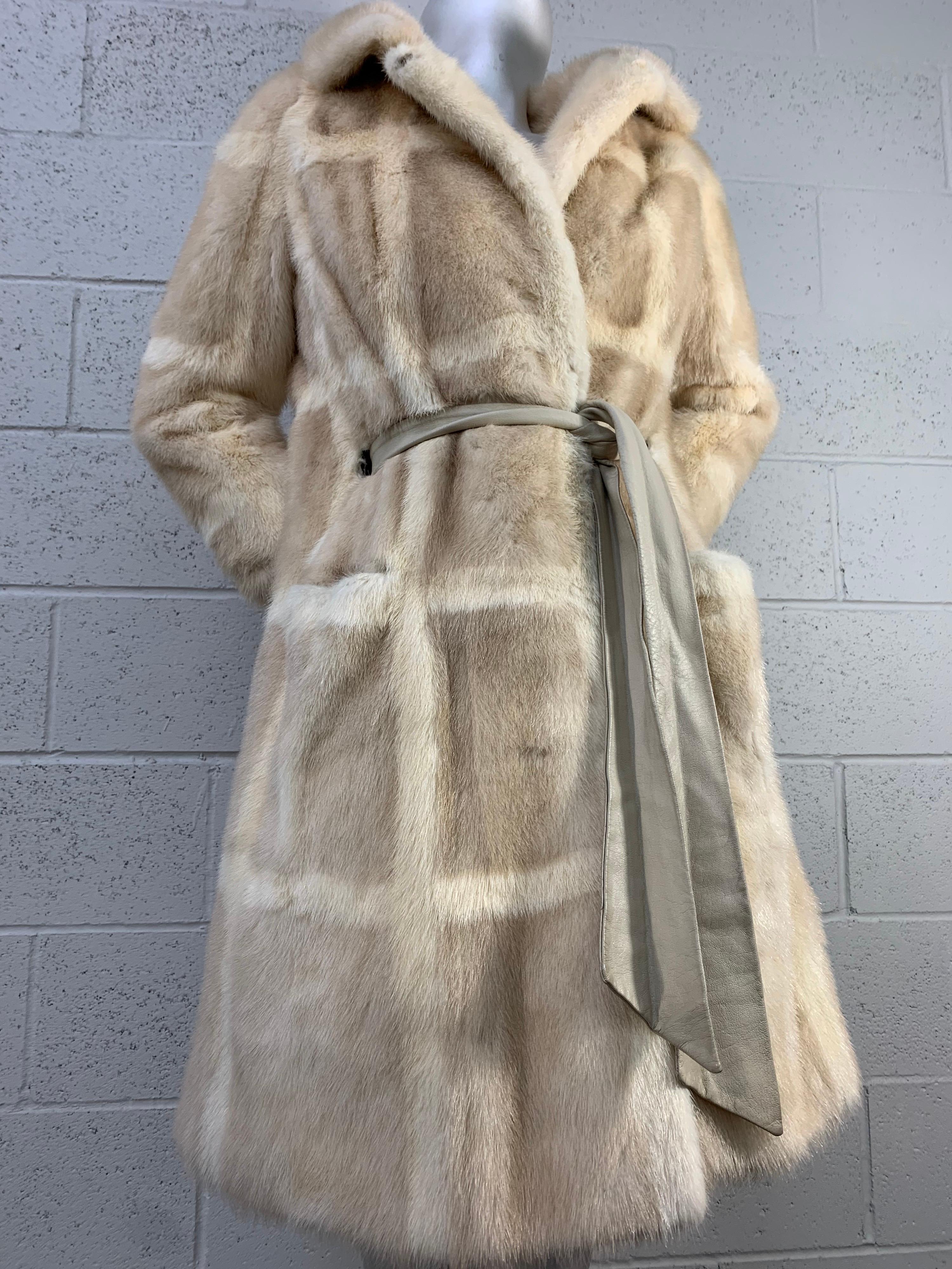 A beautiful 1960s Mod Neiman Marcus mink coat: Window pane inset design in blonde and cream fur. Beautiful graphic taffeta lining!  Original leather sash belt included. Size 6-8. 