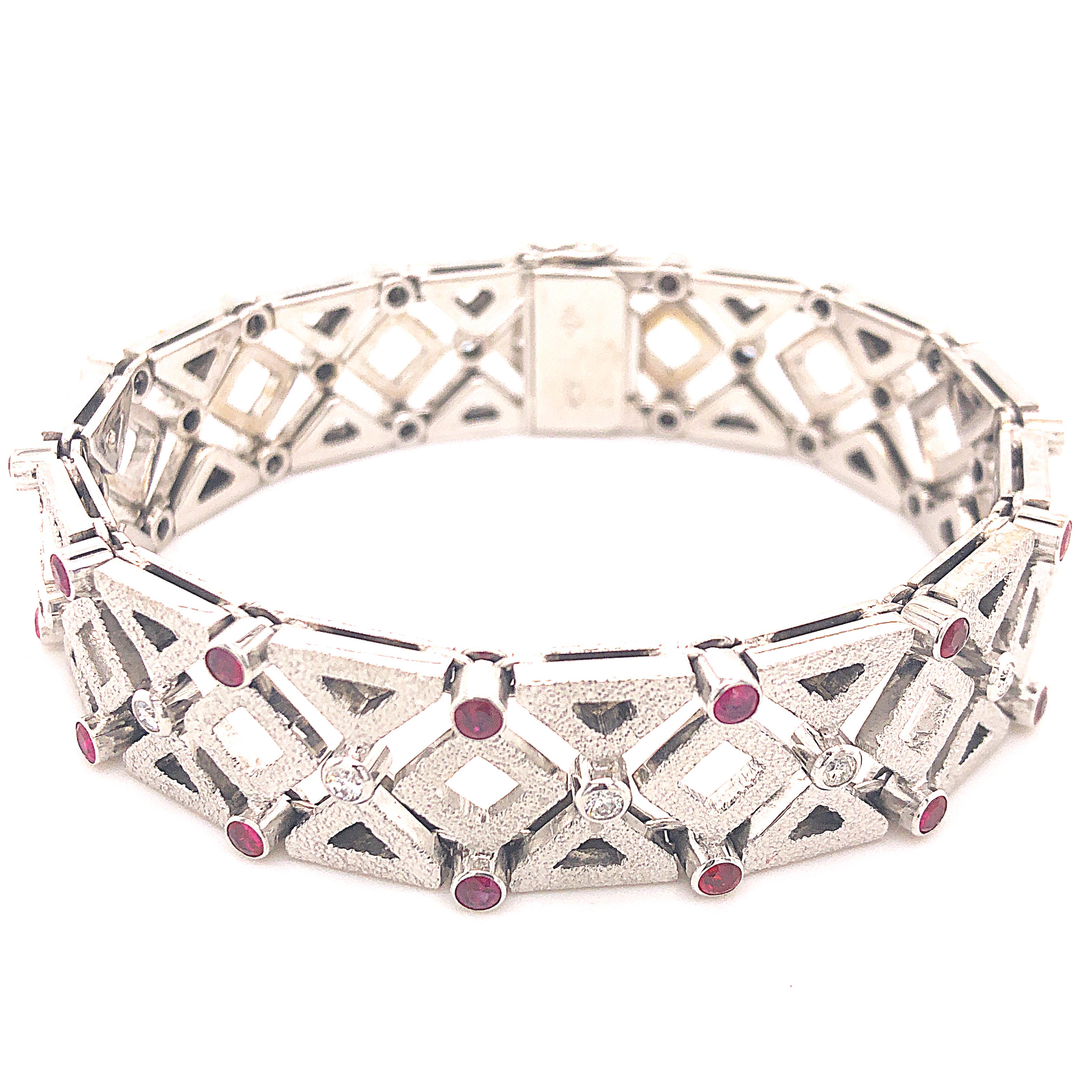 Unique, Original 1960, absolutely Chic yet Timeless Bracelet featuring 28 Burma Ruby(2.8Kt) and 15(1.20Kt) White Diamond in a White Gold Geometric Motif masterfully Handcrafted Setting(7.20inches, 18.3cm Lenght, 0.6inches, 16mm Height), 60.2g,